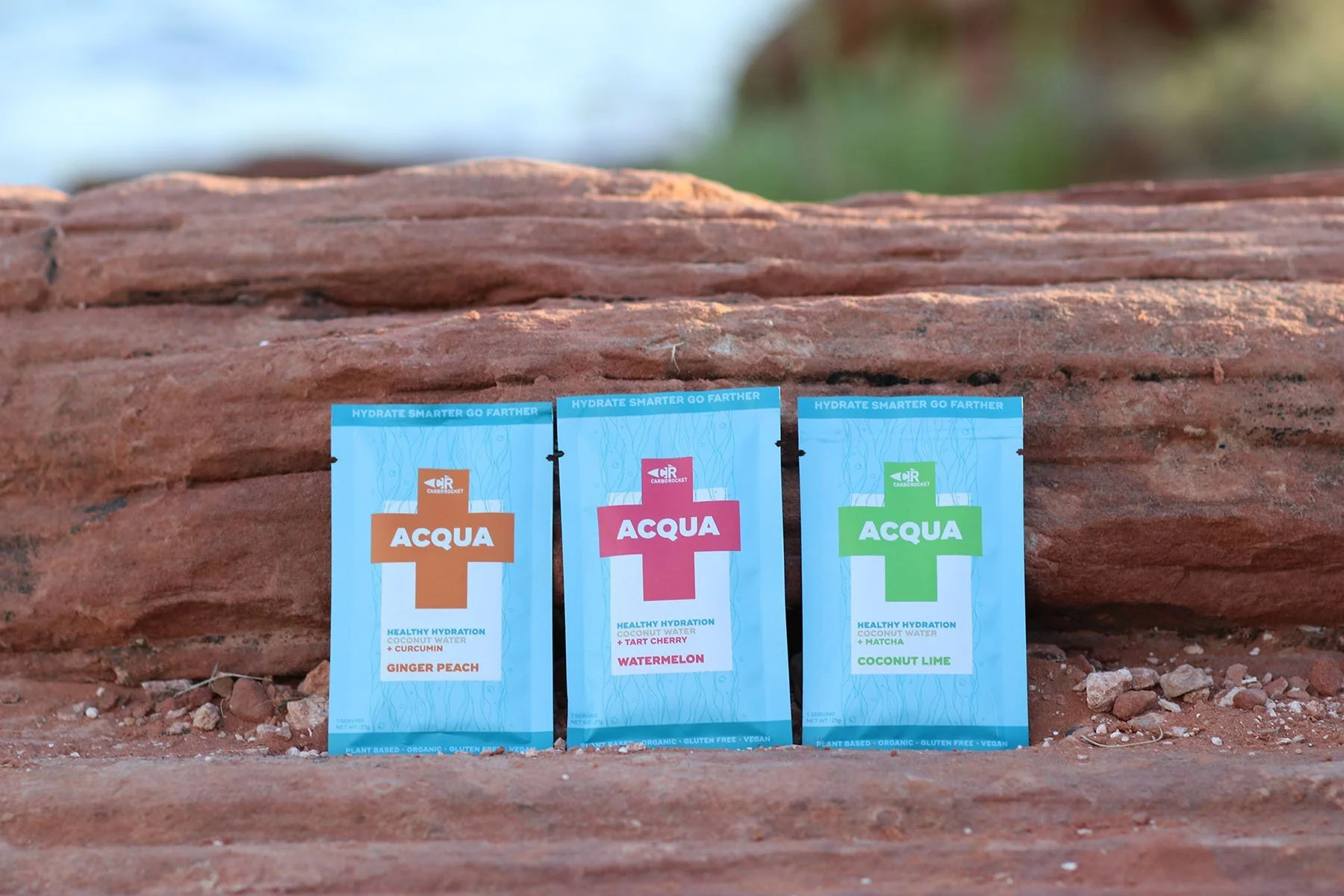 Packaging design for CarboRocket Acqua hydration drink in 3 flavors