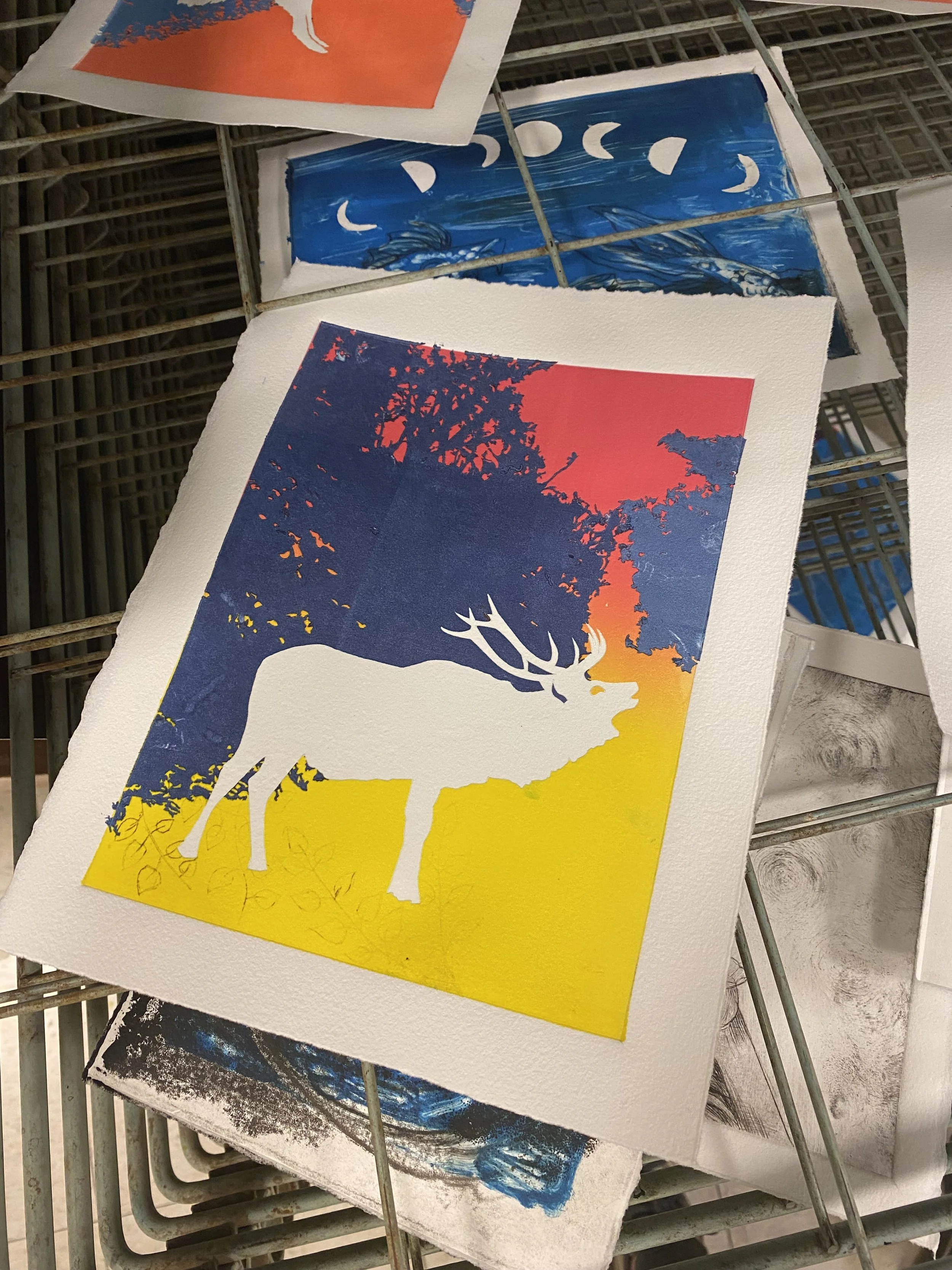 print of a white elk on a pink and yellow gradient background with purple woods