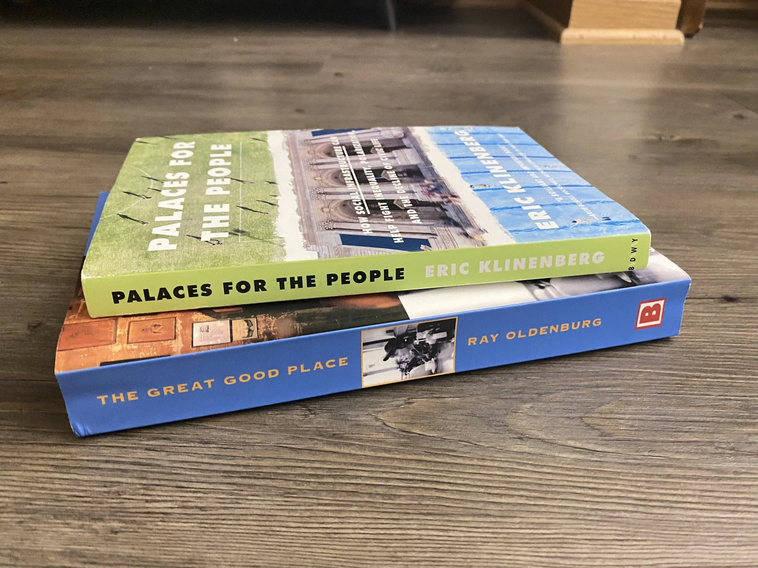 Books sitting on a floor