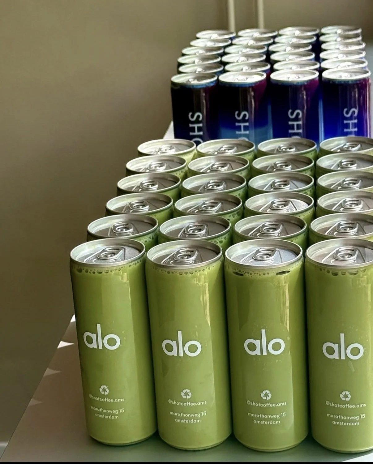 matcha and iced coffee in cans to go. Promo Alo matcha on the go. after pilates class