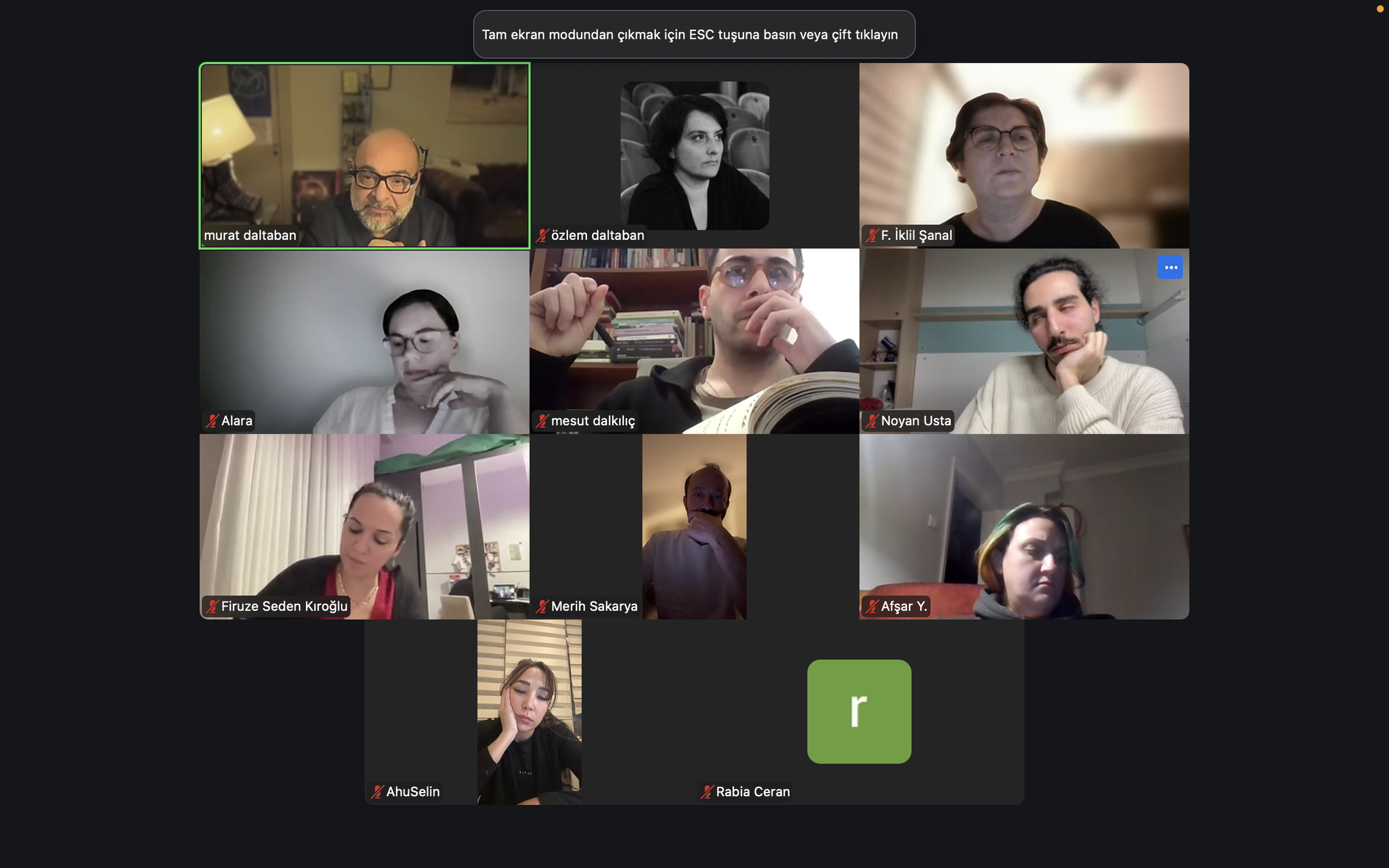 Screenshot of a virtual video conference with multiple participants, some with their video on, in a grid format.