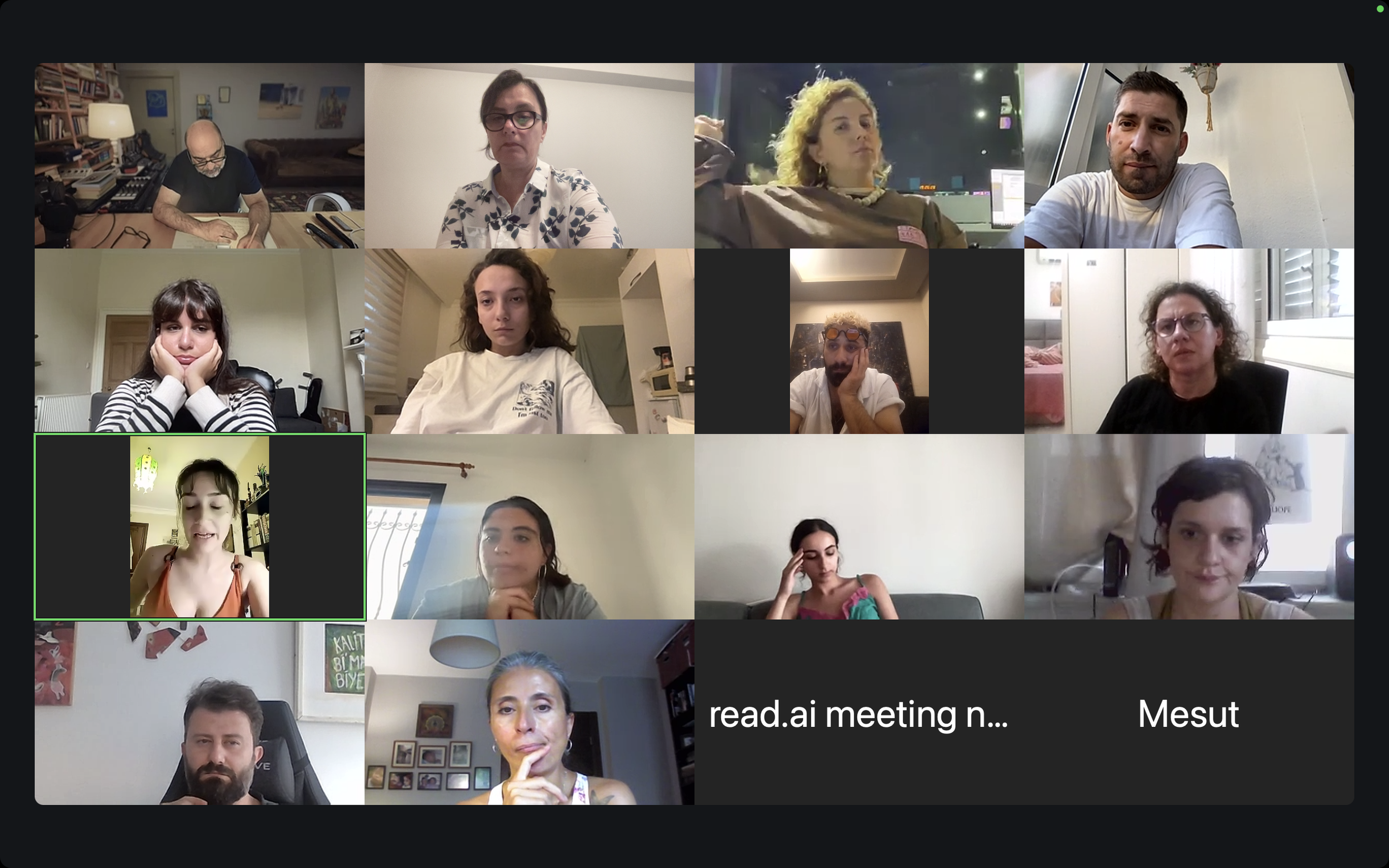Zoom video call with multiple diverse participants, some appearing thoughtful or focused, others relaxed, in various indoor settings.