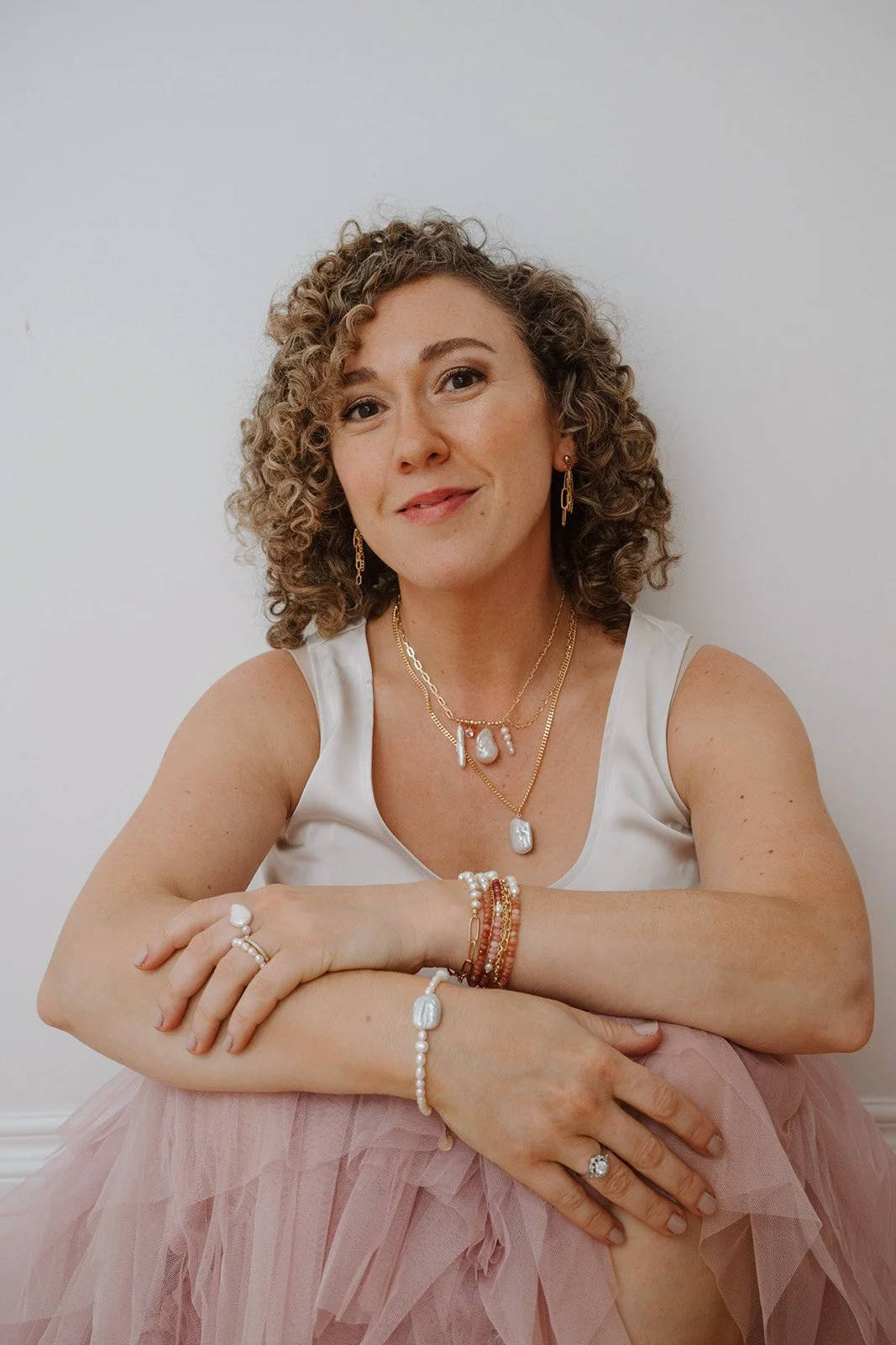 Lyndsi Seth photography- A branding portrait of a Toronto jewelry maker showcasing freshwater pearl accessories