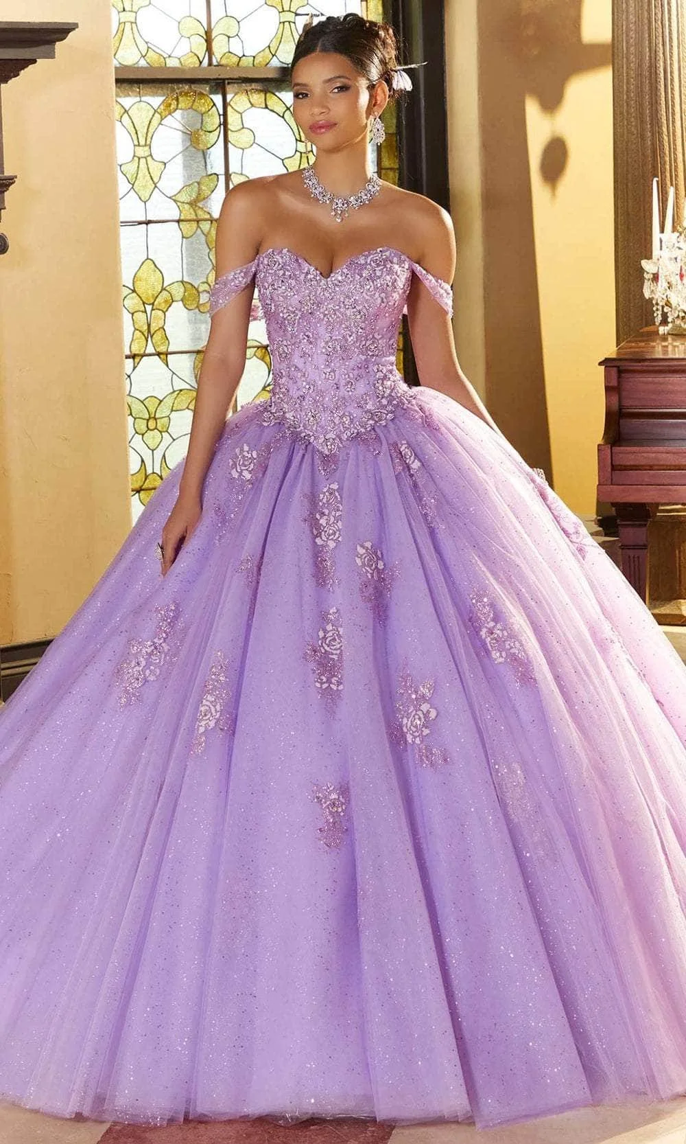 Lilac lavender quinceañera ball gown available at The Occasion House in West Hempstead NY