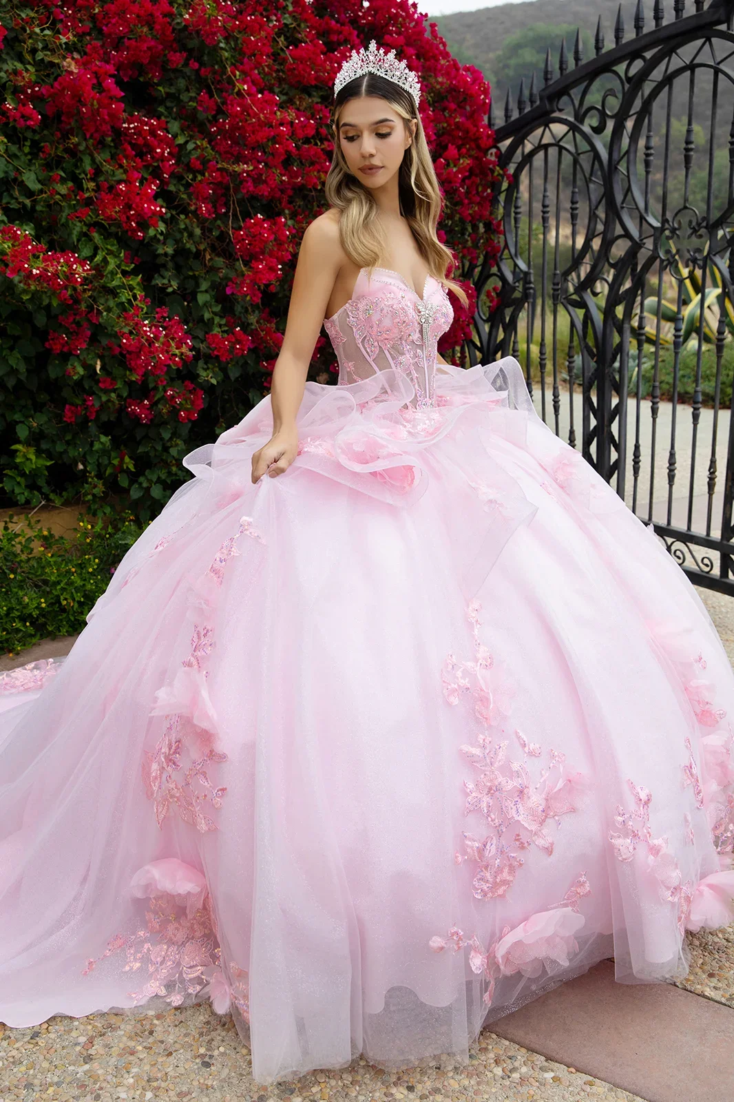 Baby pink quinceañera ball gown available at The Occasion House in West Hempstead NY