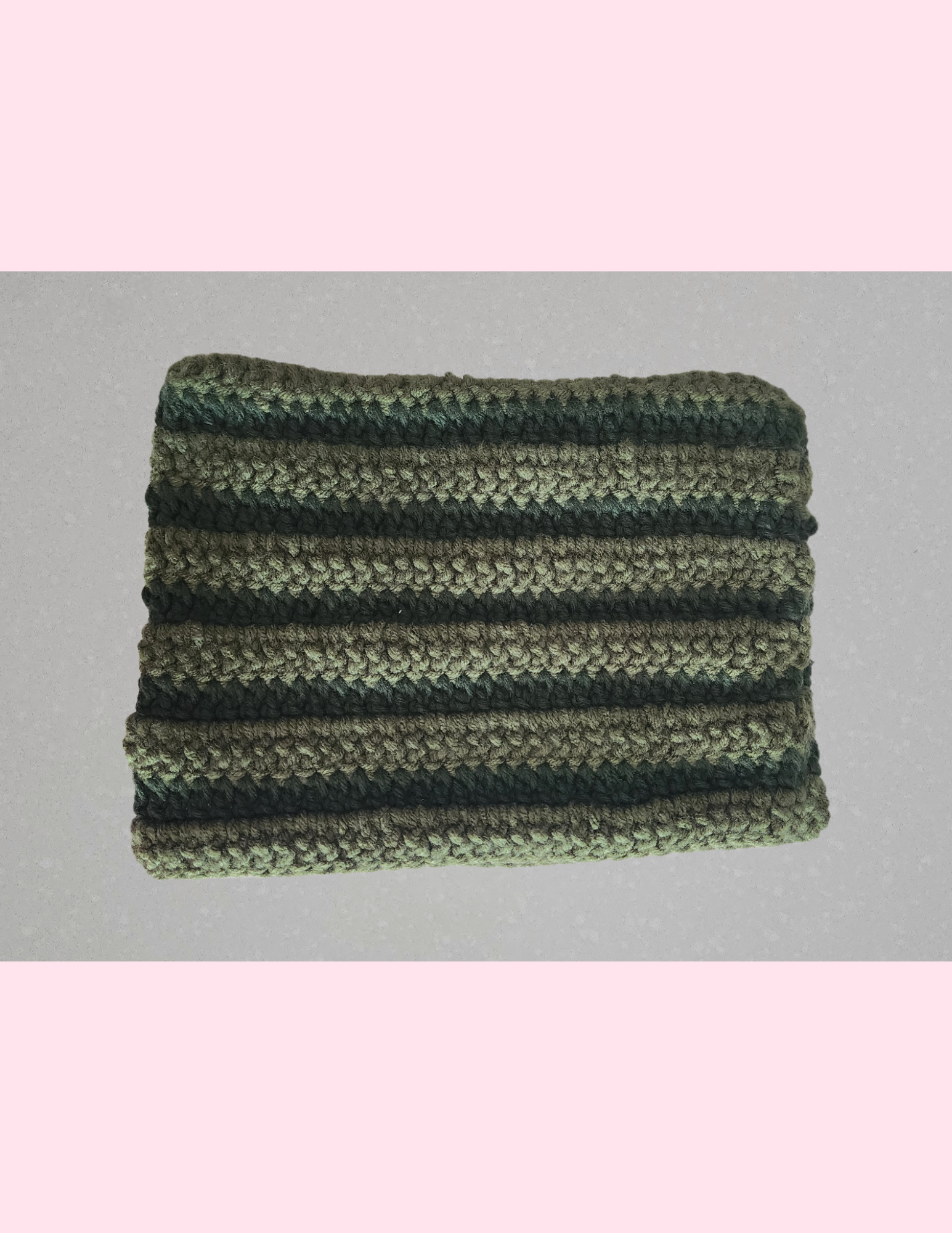 green cat beanie on counter (4).png