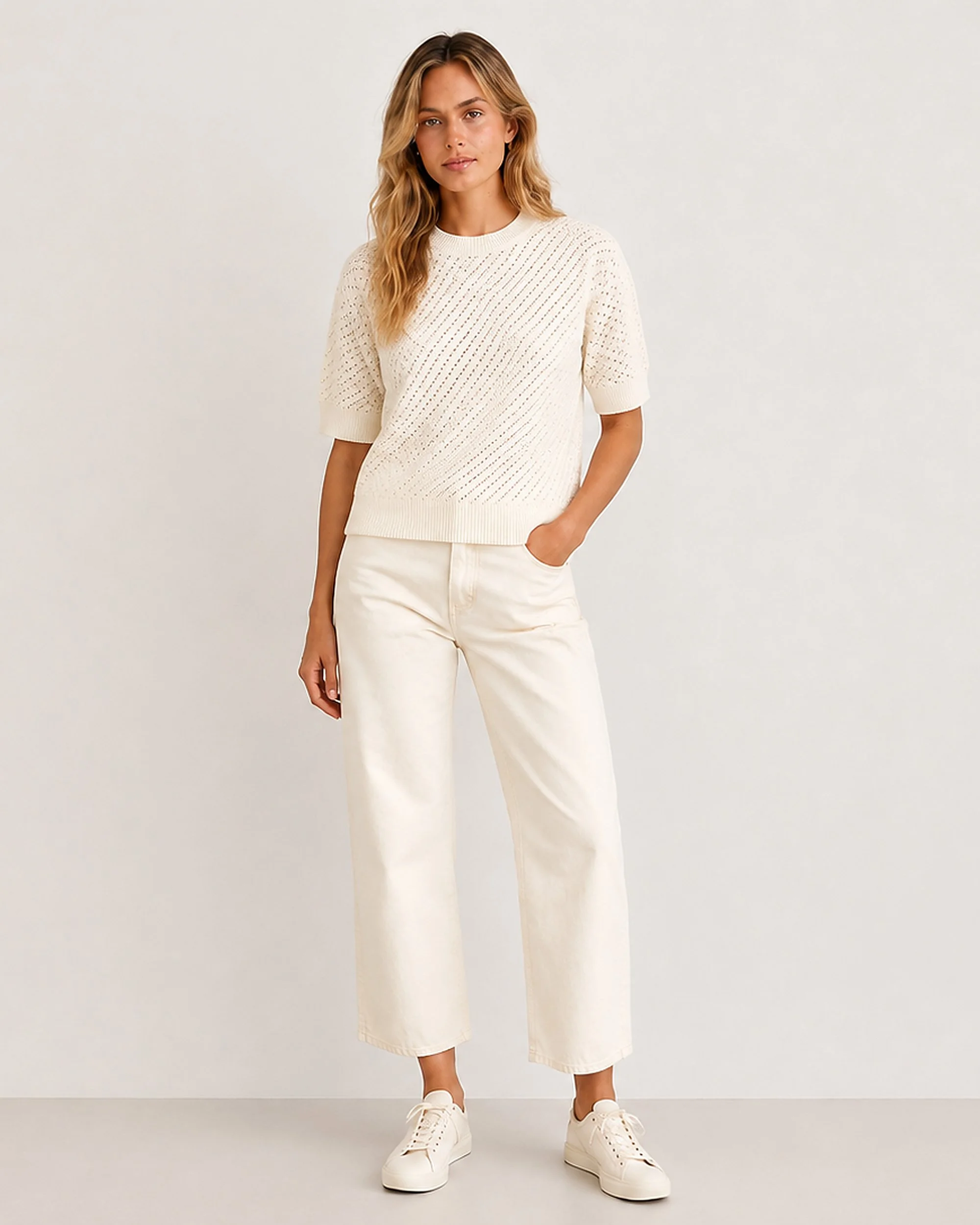 The Flax Studio cream Mulberry Silk-Cotton Pointelle Knit styled with light trousers.