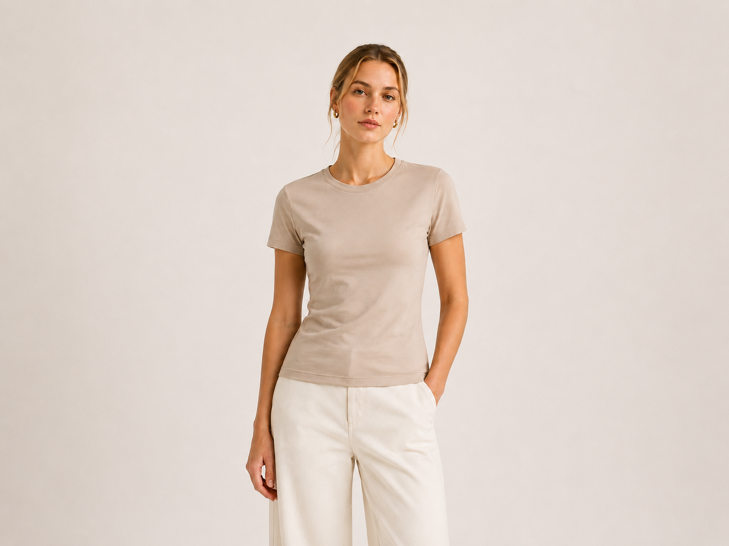 Front view of The Flax Studio sand mercerised cotton T-shirt, showing its regular fit and short sleeves.