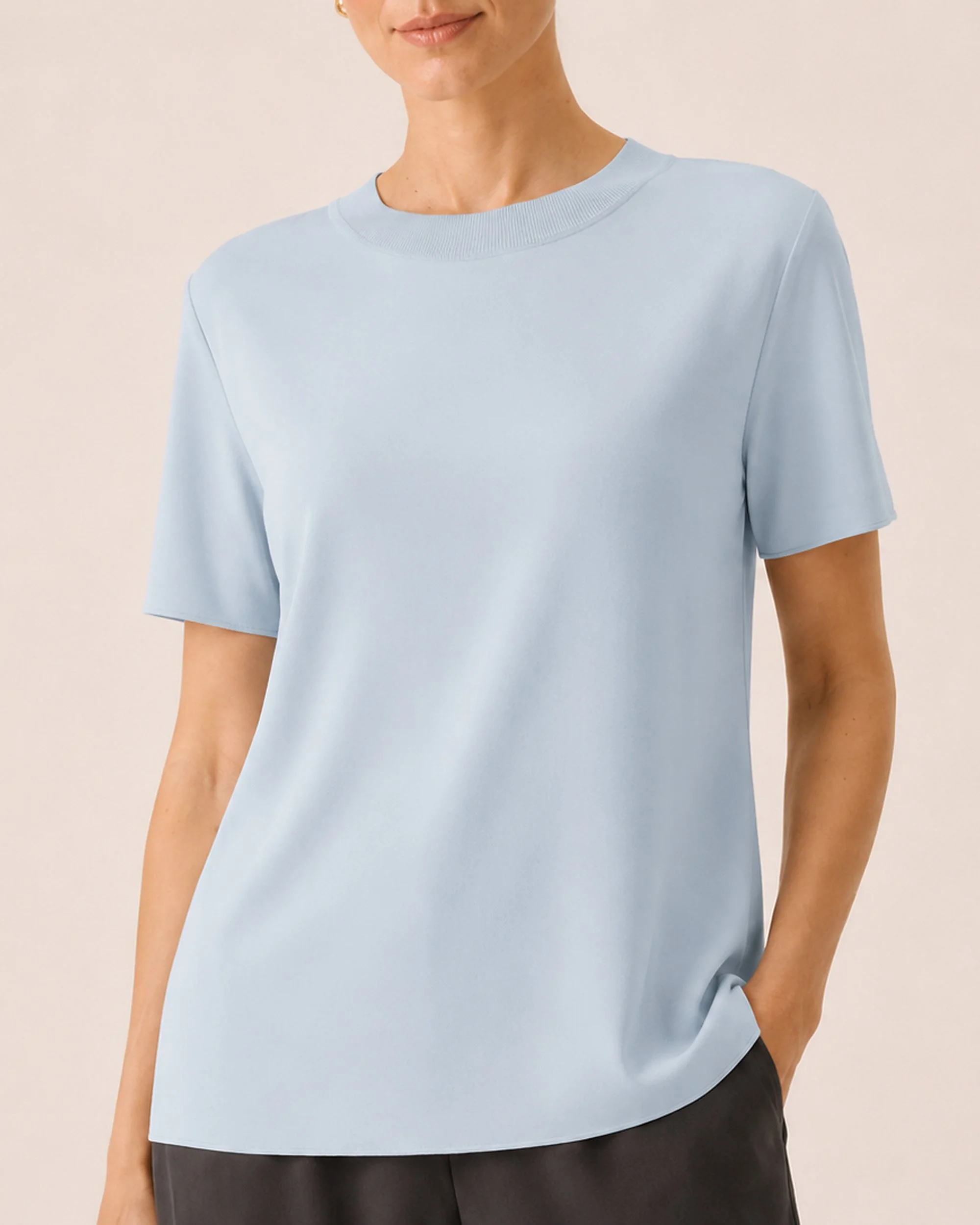 Close-up of The Flax Studio blue Silk Crew Neck Top, showing its smooth silk jersey and crew neckline.