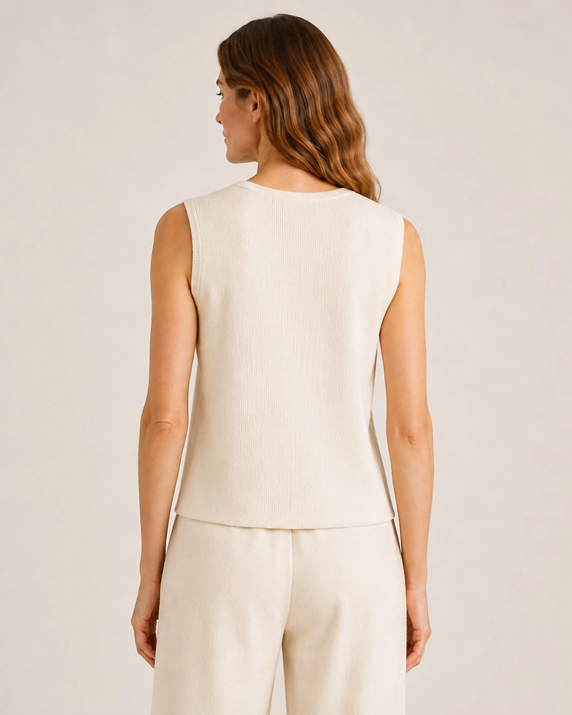 Back view of The Flax Studio cream Fine Rib Knit Set, showing the sleeveless top and matching pants.