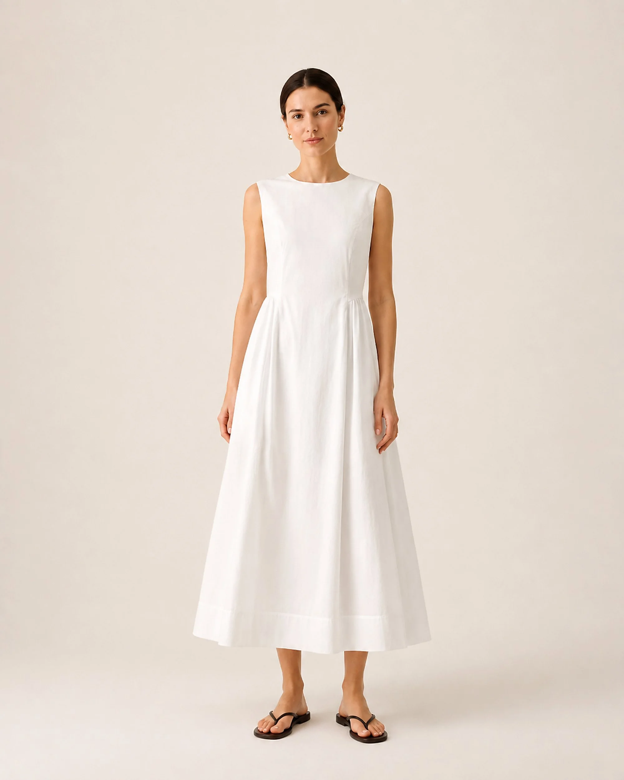 Full-length view of The Flax Studio white Tailored Dress with a softly defined waist.