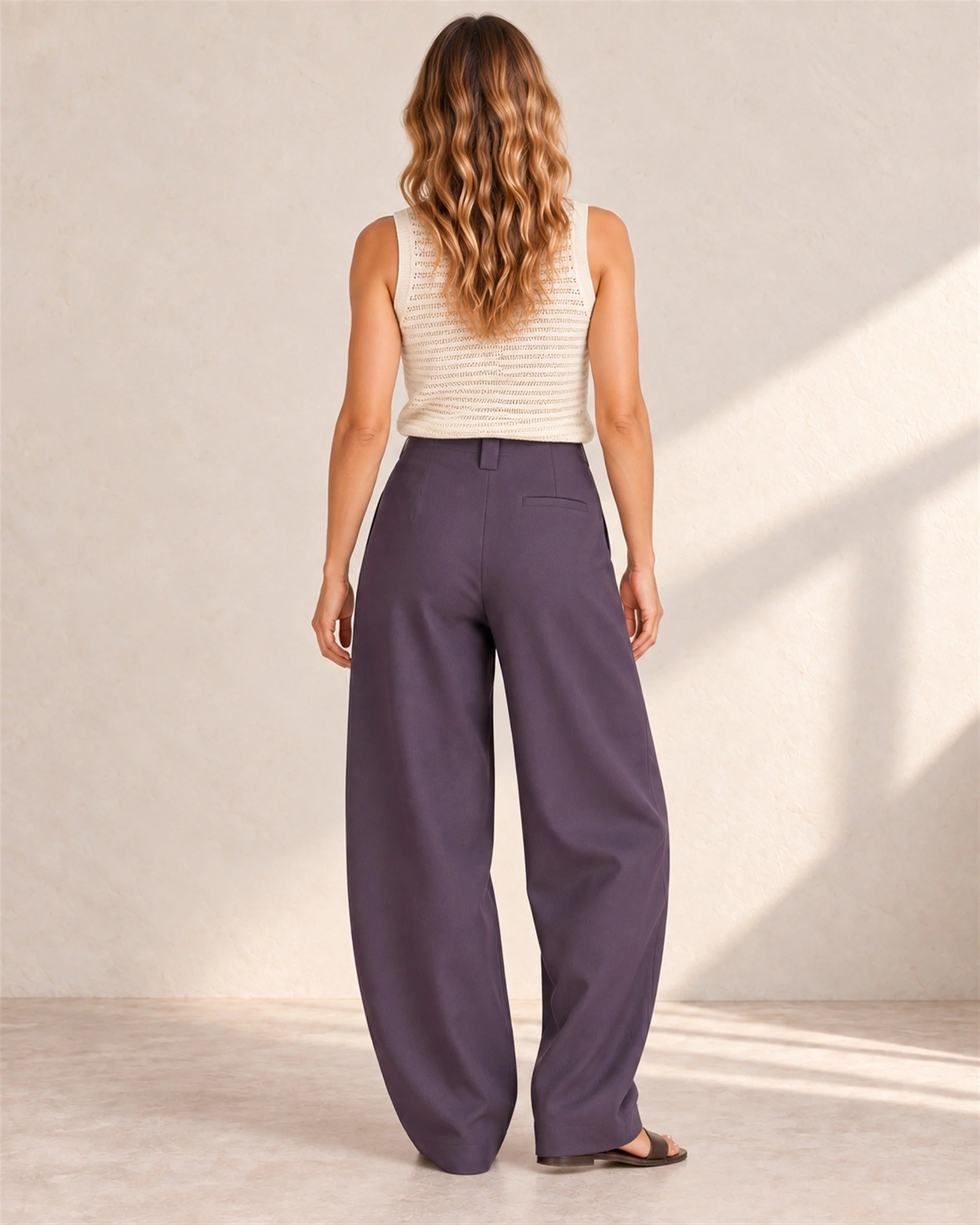 Aubergine Fluid Pant, back view on a model.
