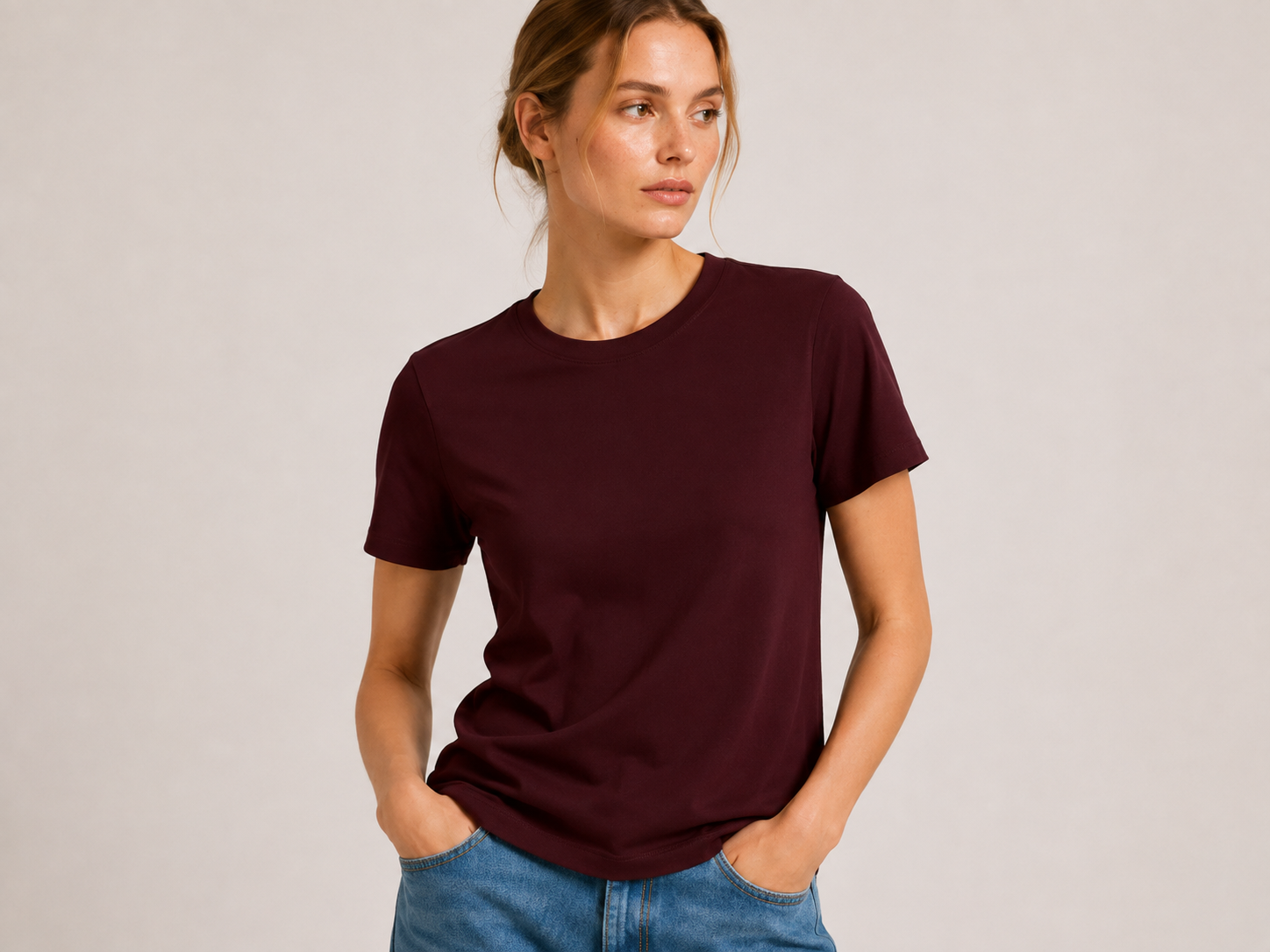 Close-up of The Flax Studio chocolate mercerised cotton T-shirt, showing the crew neckline and smooth fabric.