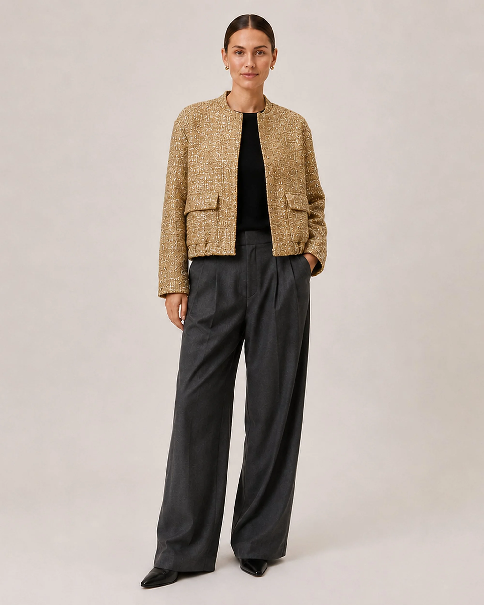 The Flax Studio Textured Gold Jacket worn over black separates, showing the relaxed silhouette.