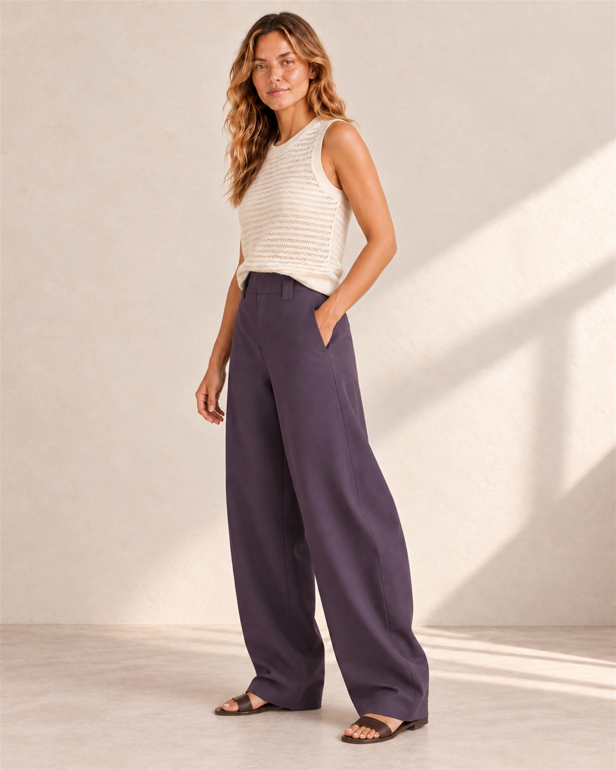 Aubergine Fluid Pant, three-quarter view on a model.