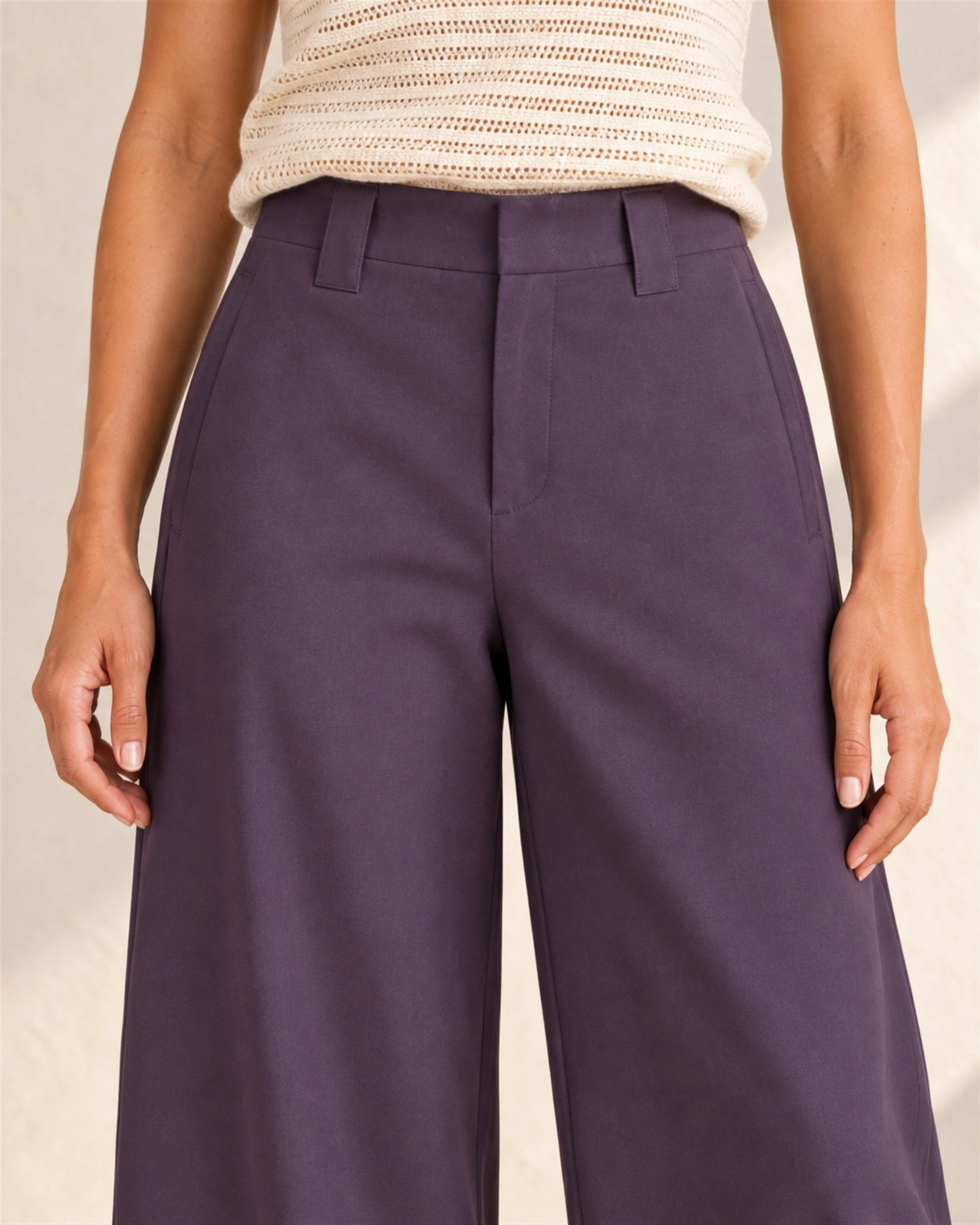 Aubergine Fluid Pant, close-up of the waistband and pocket openings.