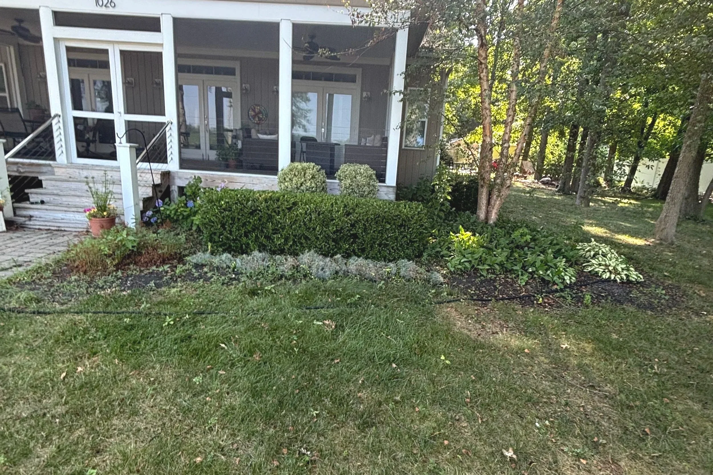 Bush trimming that boost curb appeal.