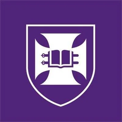 Purple shield emblem with an open book and electrical circuit symbols inside.