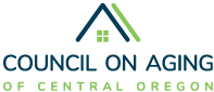 Logo of the Council on Aging of Central Oregon, featuring a stylized house with a roof and a chimney, and the organization's name in blue and green text.