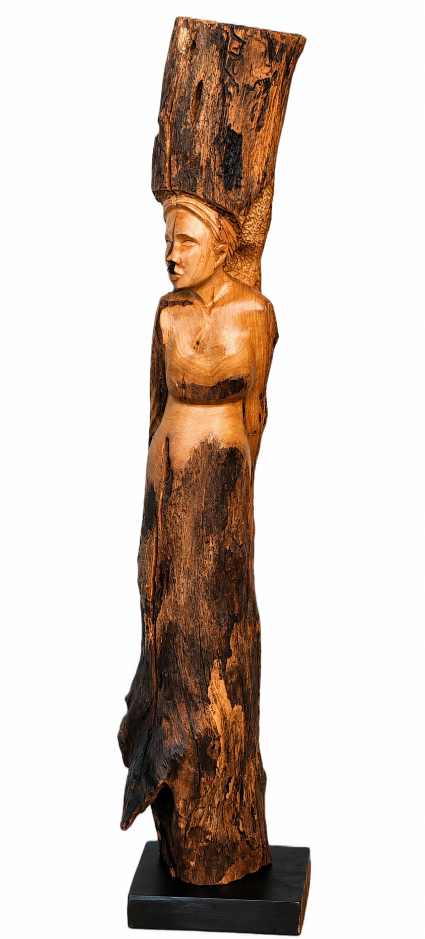 INDÍGENA

Madera: Guachipelín
Dimensiones:  29"(H)×6"(W)x5"(D) 

Un homenaje a las raíces ancestrales y al profundo respeto por la naturaleza. La obra celebra la conexión entre el ser humano y la madera, símbolo de la tierra que sostiene y da vida.