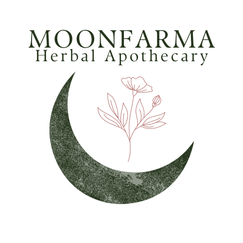 Logo for MoonFarma Herbal Apothecary featuring a crescent moon with a flower and leaves, text in green.