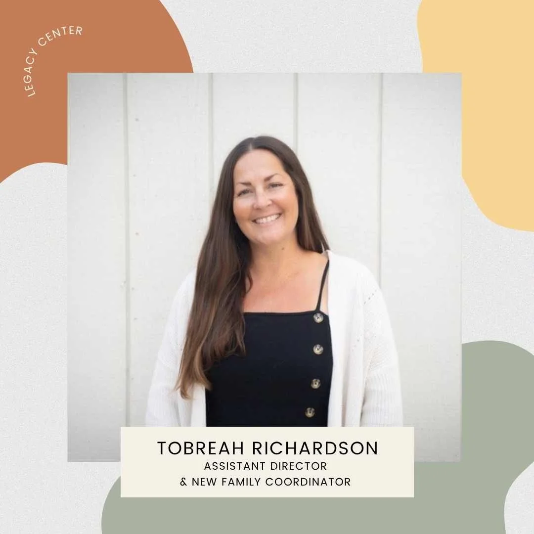 A woman with long brown hair smiling in front of a white wooden wall, wearing a black top with buttons and a white cardigan. The image has a colorful abstract background with the text 'Tobreah Richardson, Assistant Director & New Family Coordinator' and 'Legacy Center'.