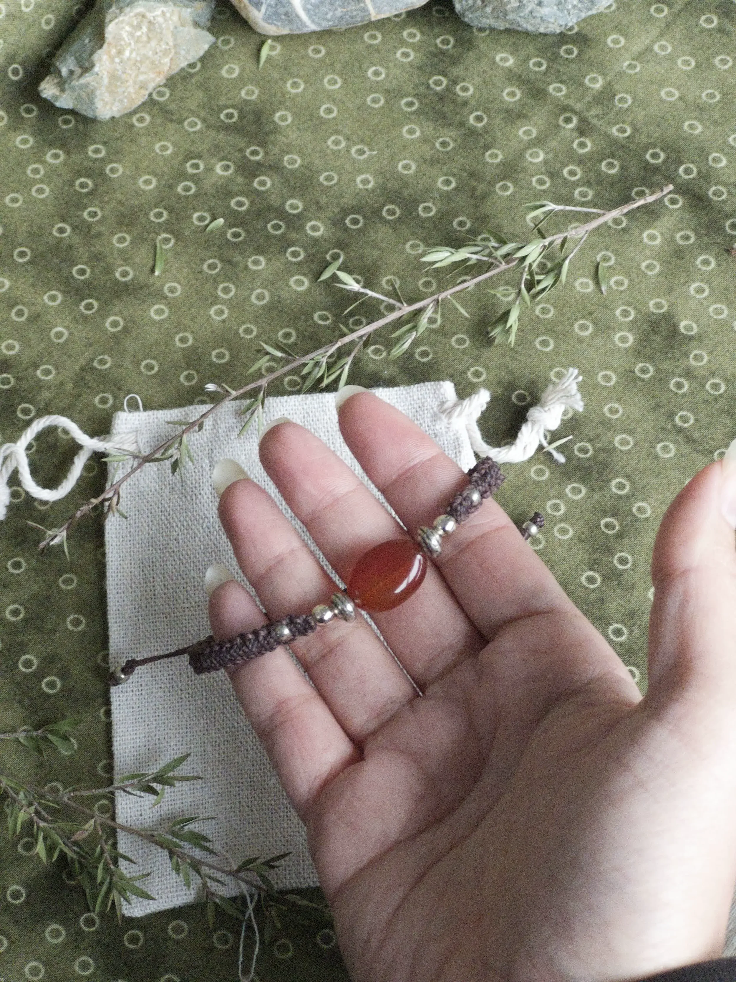 carnelian bracelet hand.webp
