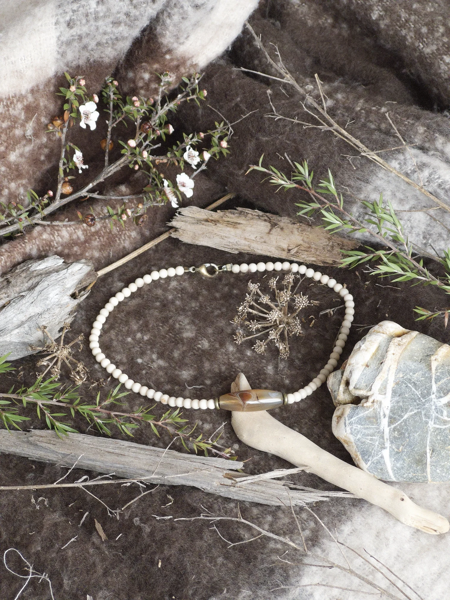 White Earthy necklace on Bone.webp