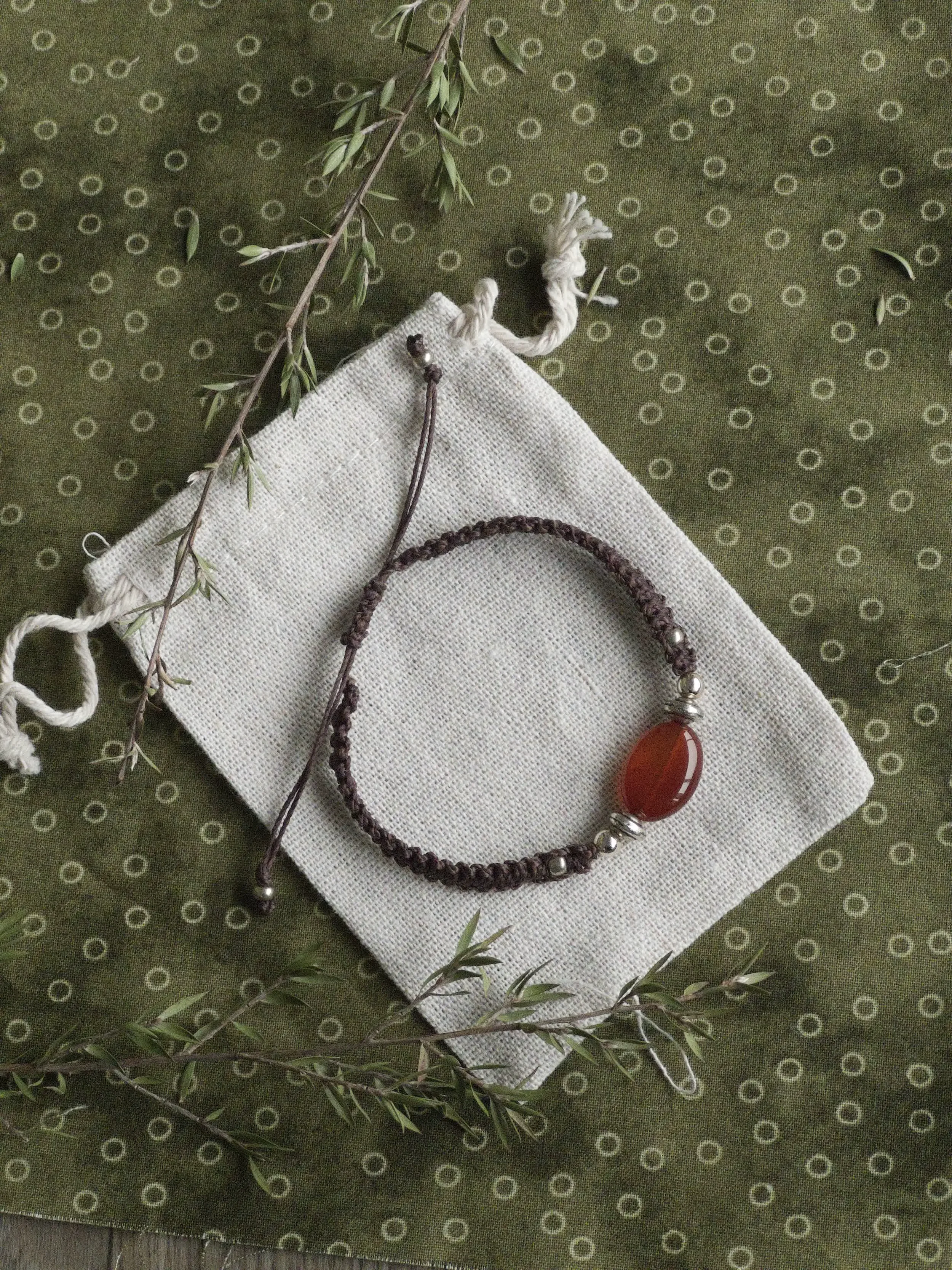 carnelian bracelet on bag 2.webp