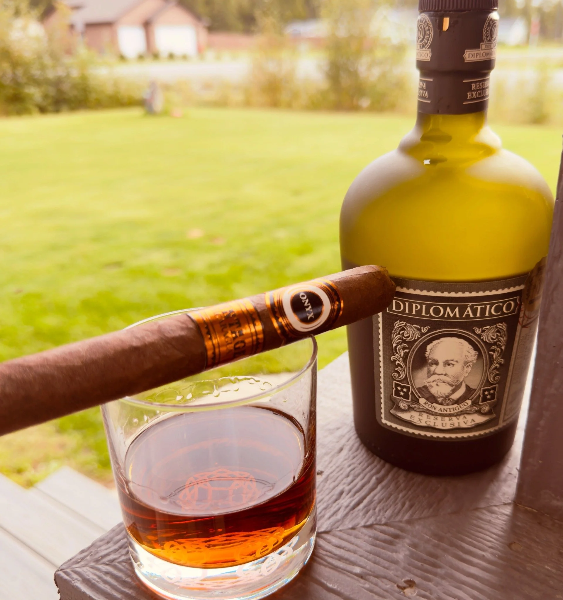 An Onyx cigar with Diplomático rum on the Shale House porch.