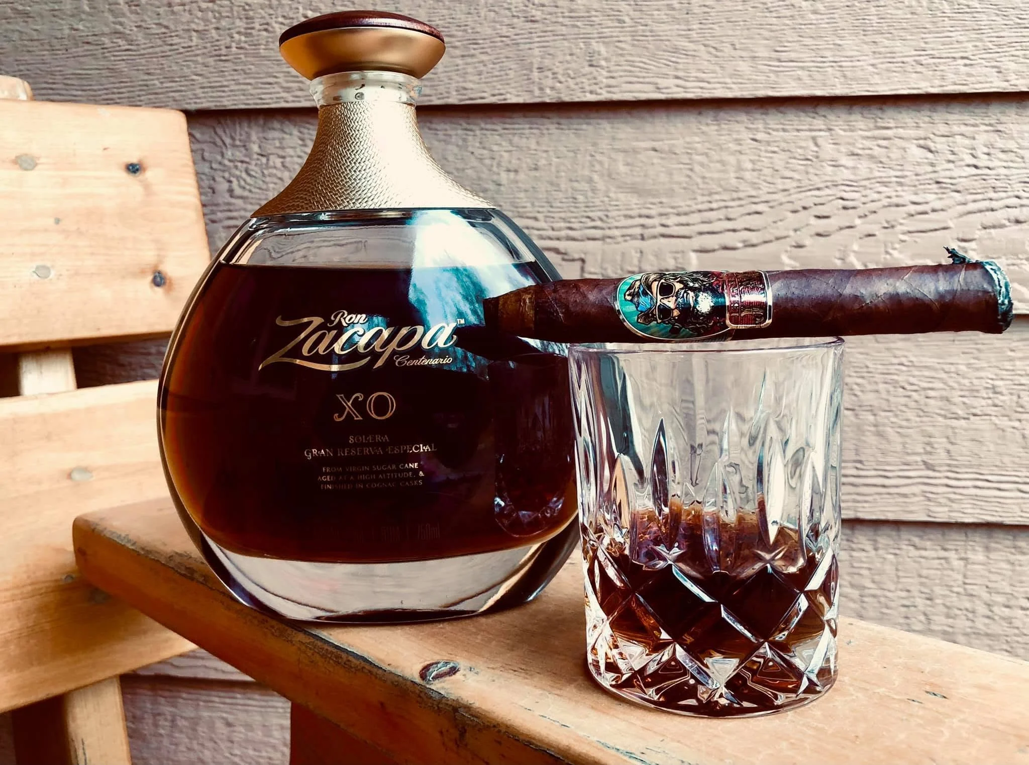 Ron Zacapa rum, a cigar, and a glass on the Shale House porch.