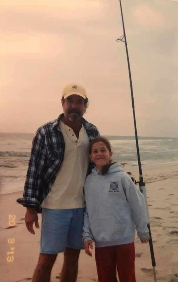 A father and daughter fishing on the beach together. A daughter who lost her father.