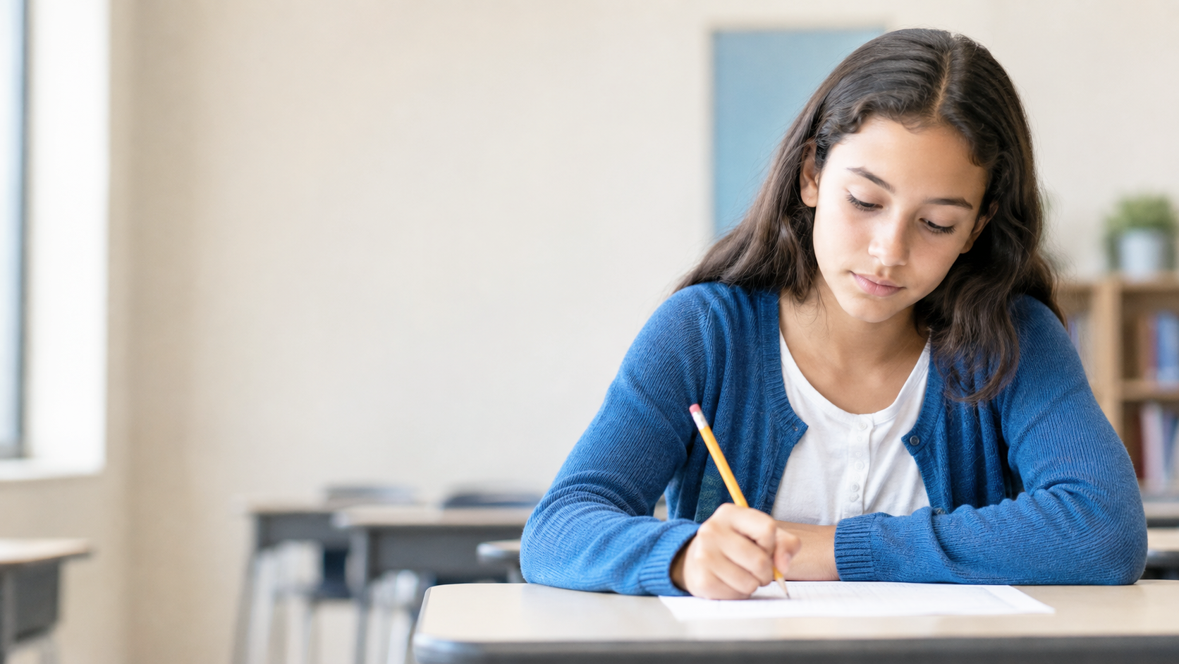Student completing a written task during a psychoeducational assessment