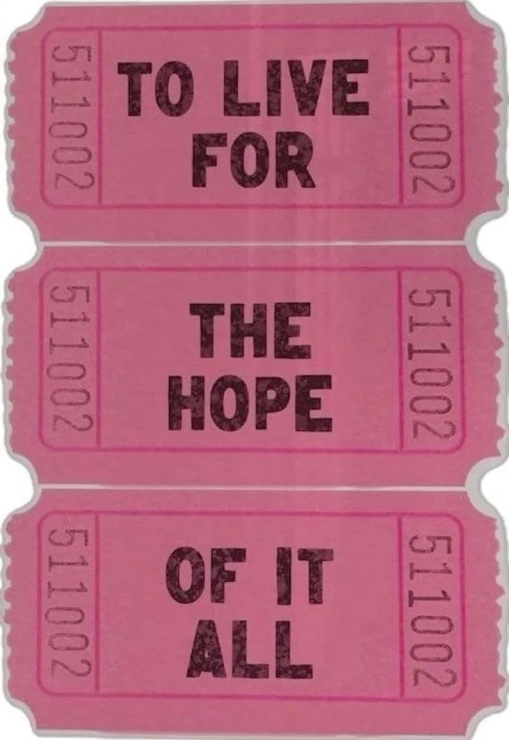 Three pink tickets with black text that read: "To live for the hope of it all."