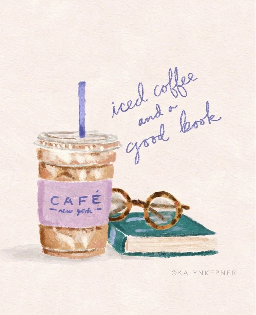 Watercolor illustration of a to-go coffee cup with a purple sleeve labeled 'Café New York', a lid, and a straw, sitting next to a closed book and a pair of tortoiseshell glasses; handwritten text reads 'iced coffee and a good book.'