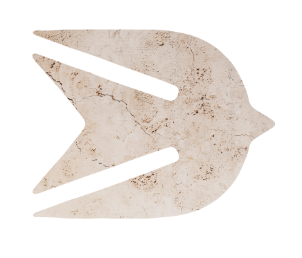 A weathered wooden arrow pointing to the right.