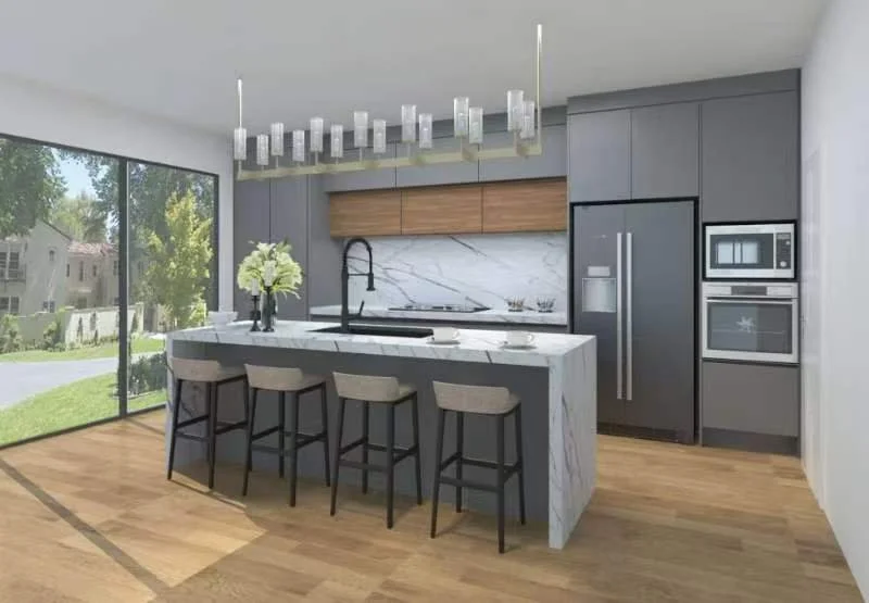 Modern kitchen with a marble island and four beige bar stools, gray cabinets, built-in microwave and oven, stainless steel refrigerator, large window showing a backyard, and a contemporary chandelier.