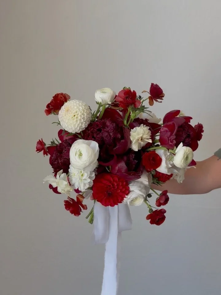And now a moment for the Personals 😍 - the Bride requested all white &amp; red. For the Bridesmaids, the same florals &amp; colors I used for the centerpieces. 🔥❤️🧡