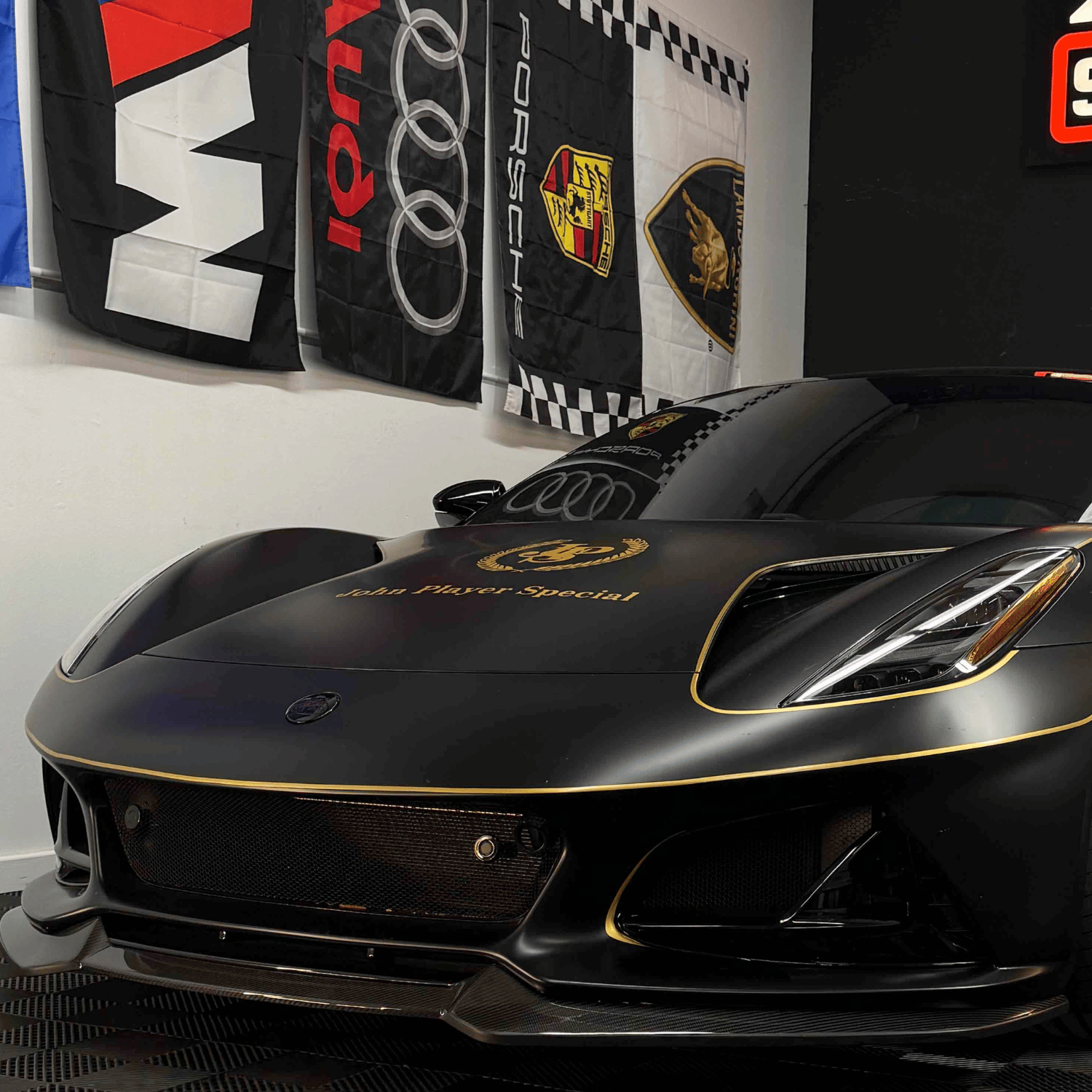 Lotus Emira with matte PPF with custom vinyl pinstripping