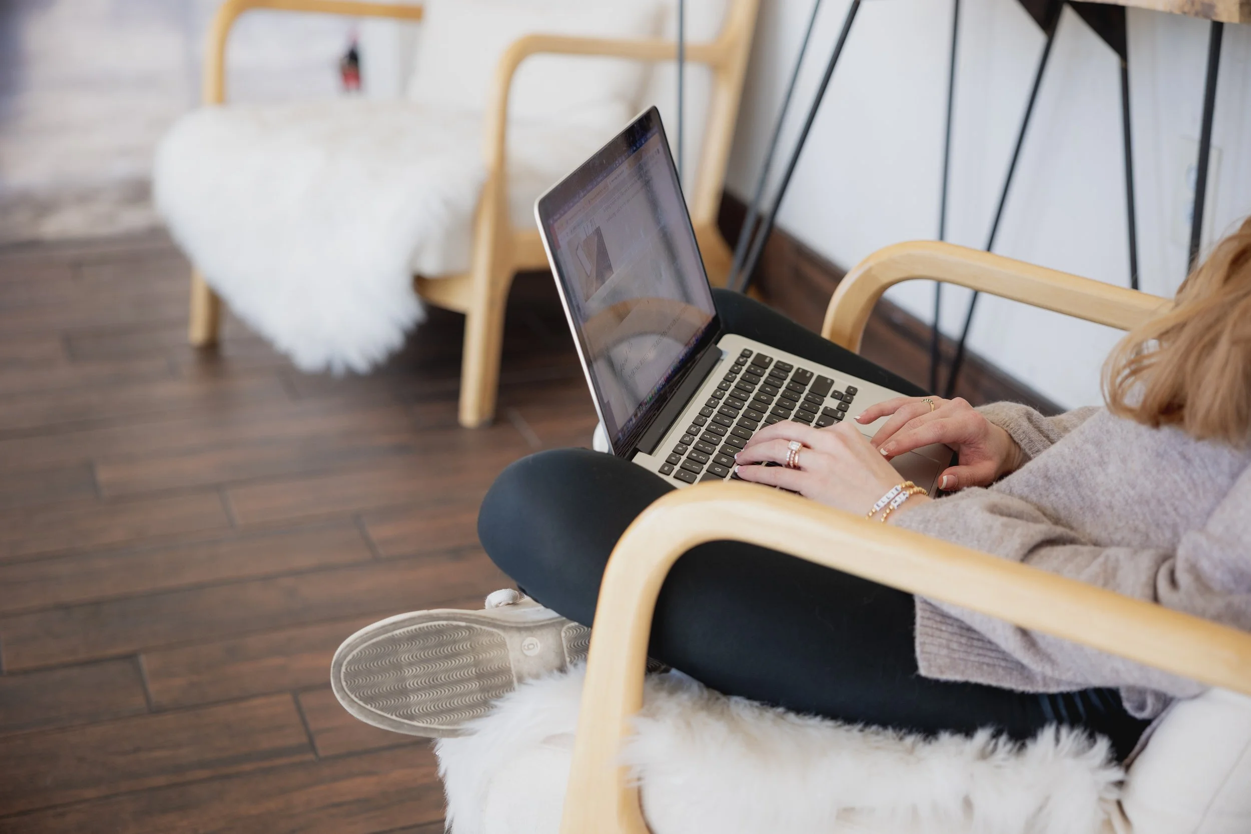 Salt Social Co Typing on Laptop