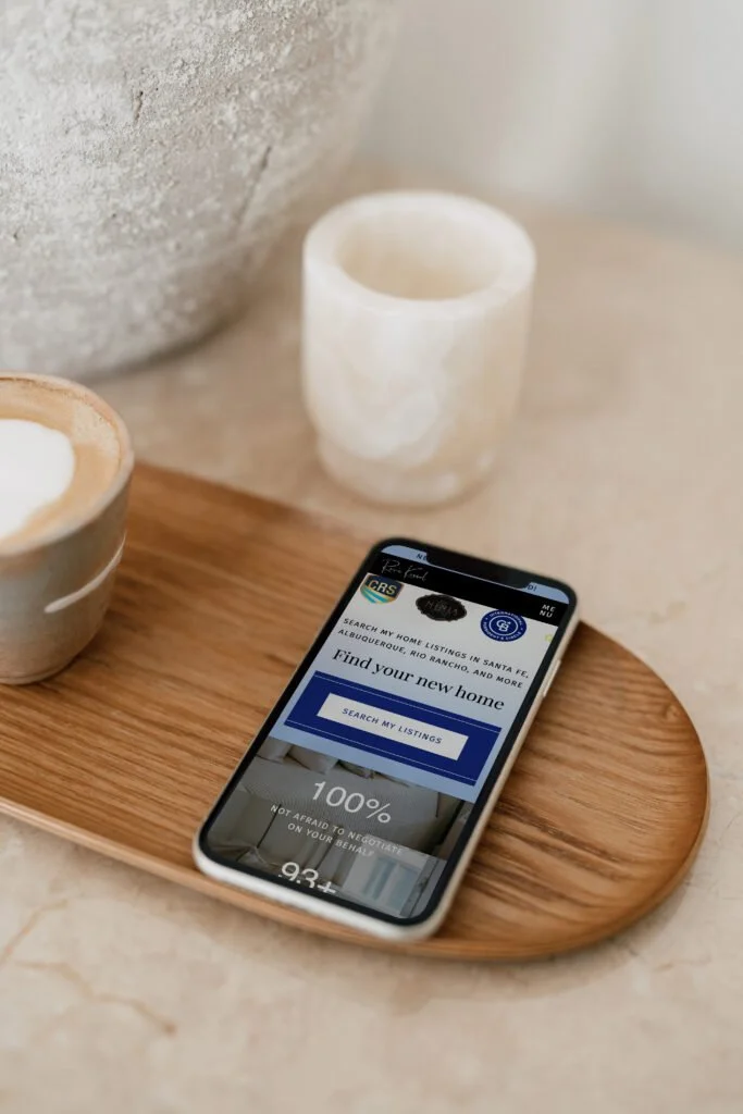 RK-Custom-Realtor-Website-Phone-on-Table-Mockup-683x1024.jpg