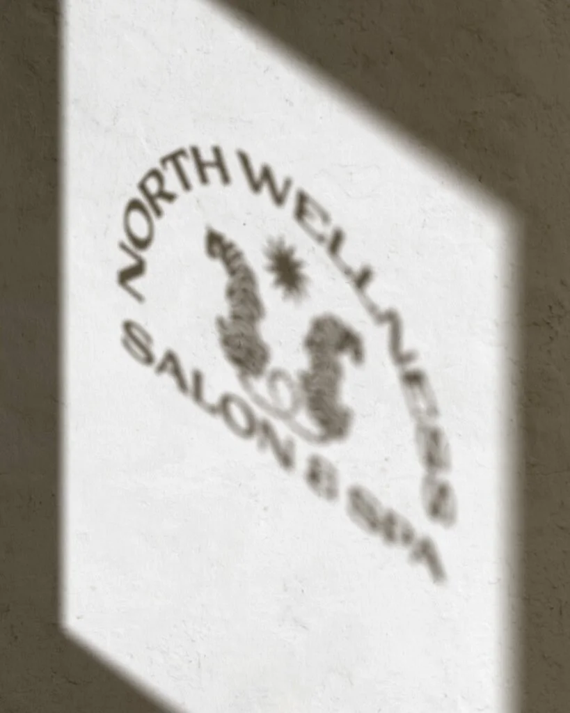 Wellness logo reflected in a shadow