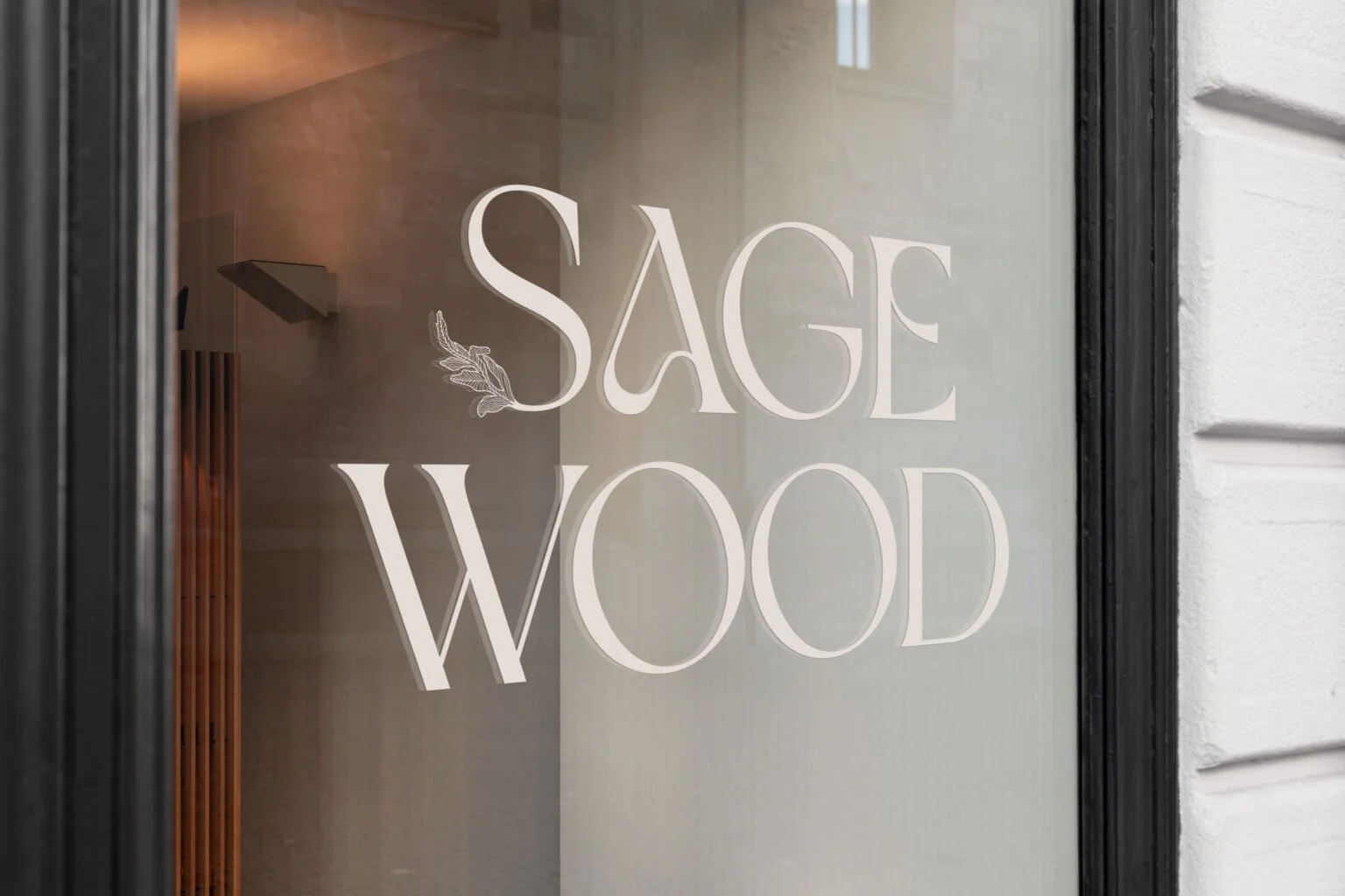 Sagewood logo applied to a glass door.