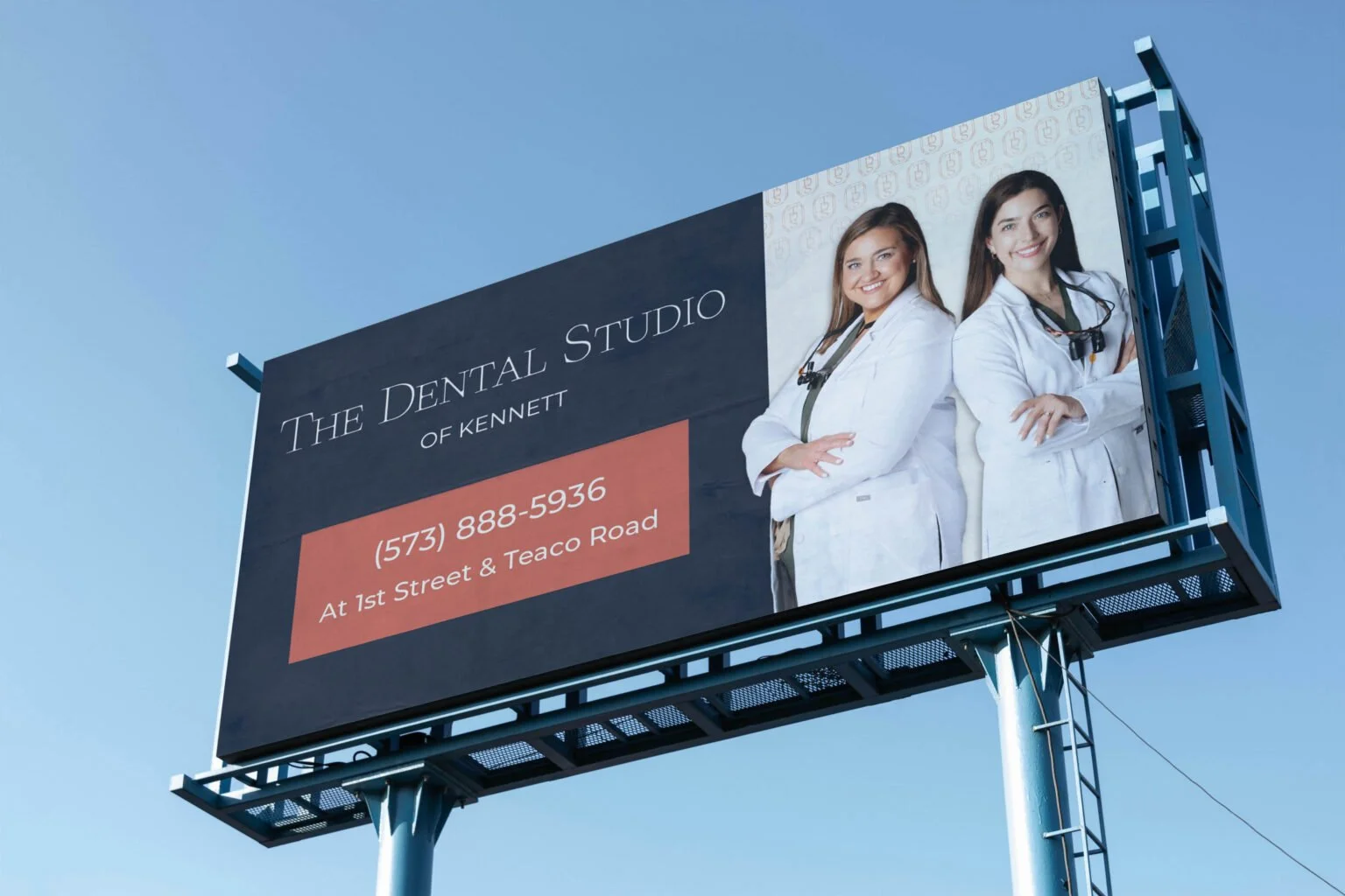 The Dental Studio advertisement displayed on a billboard.