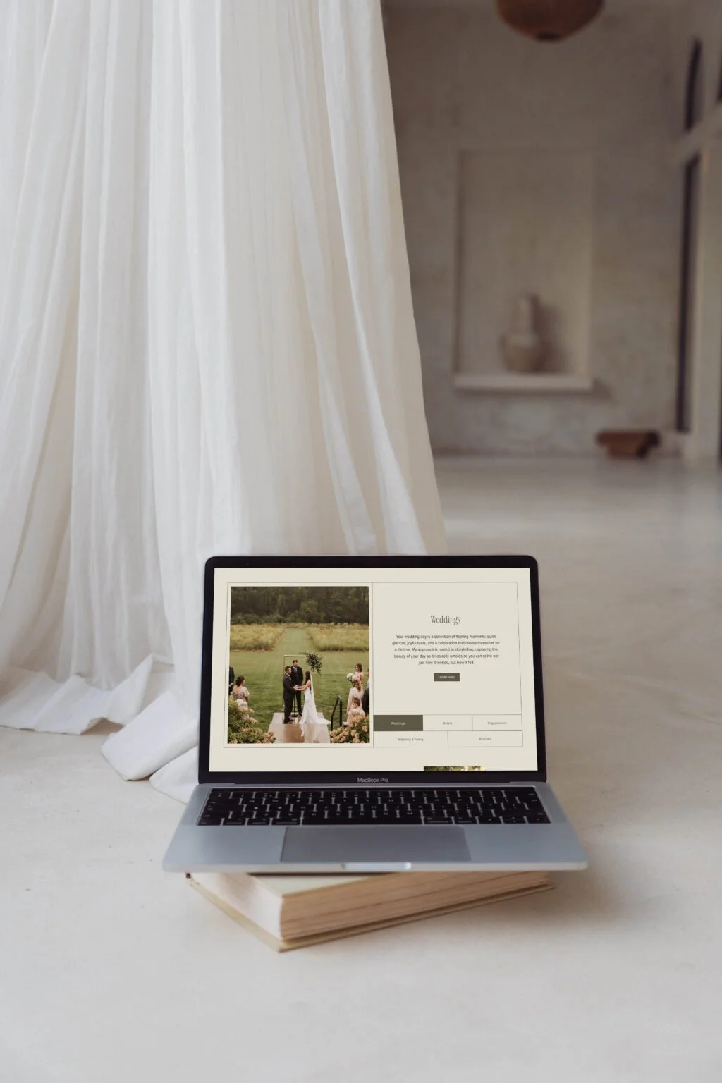 Elle May Photography website showcasing her wedding photography work.