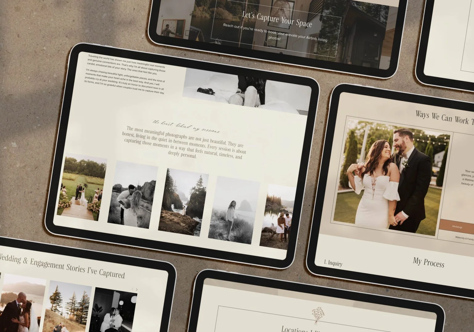 Tablet display featuring the Elle May Photography website.