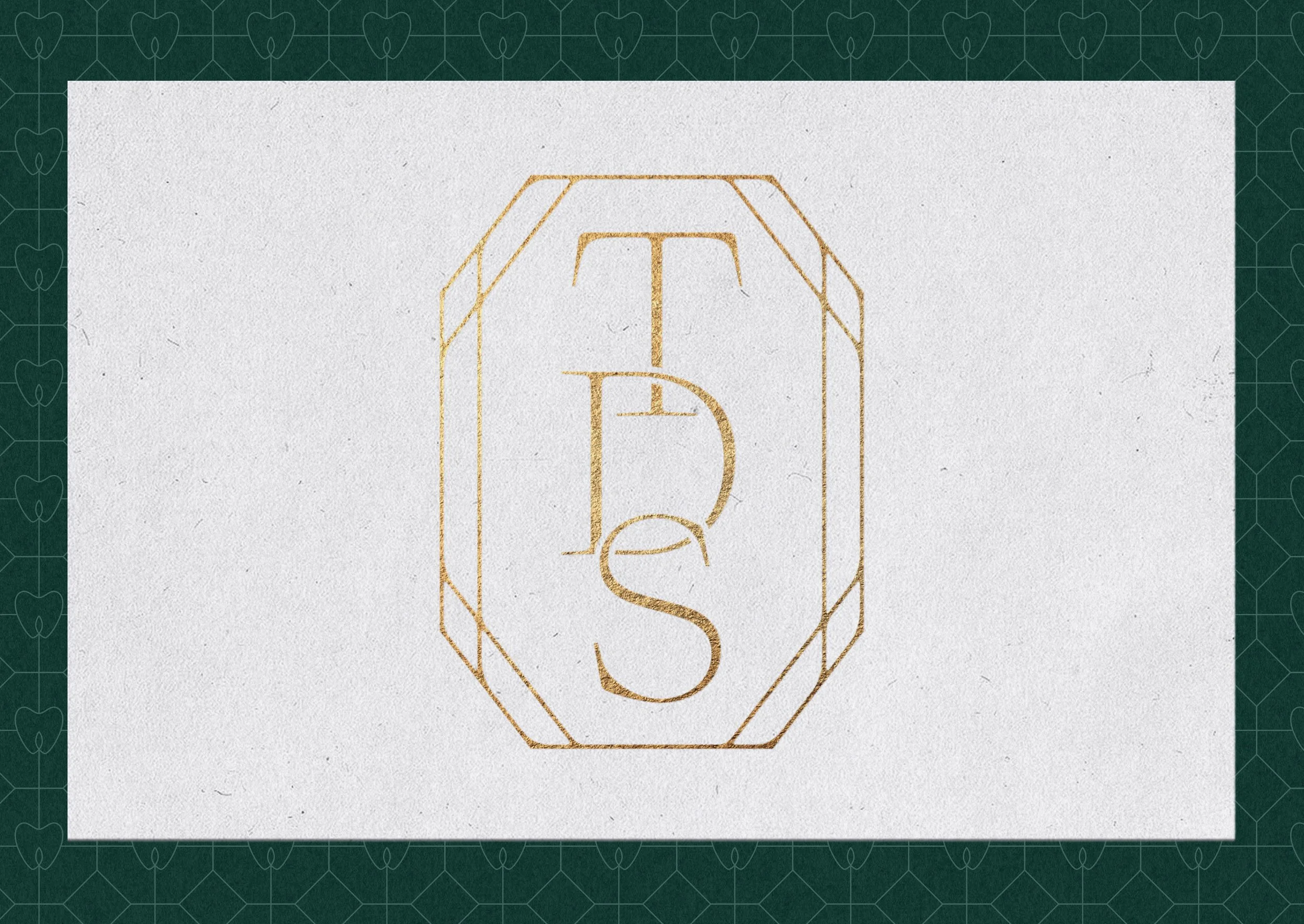 The Dental Studio submark logo in gold foil