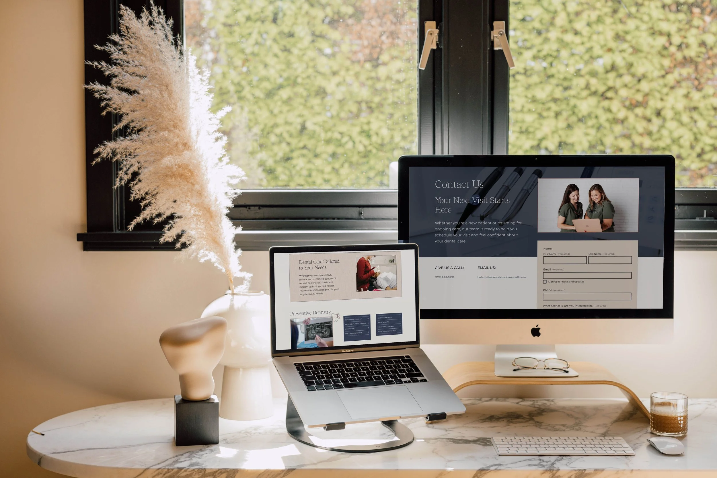 Dental practice website displayed across different devices.