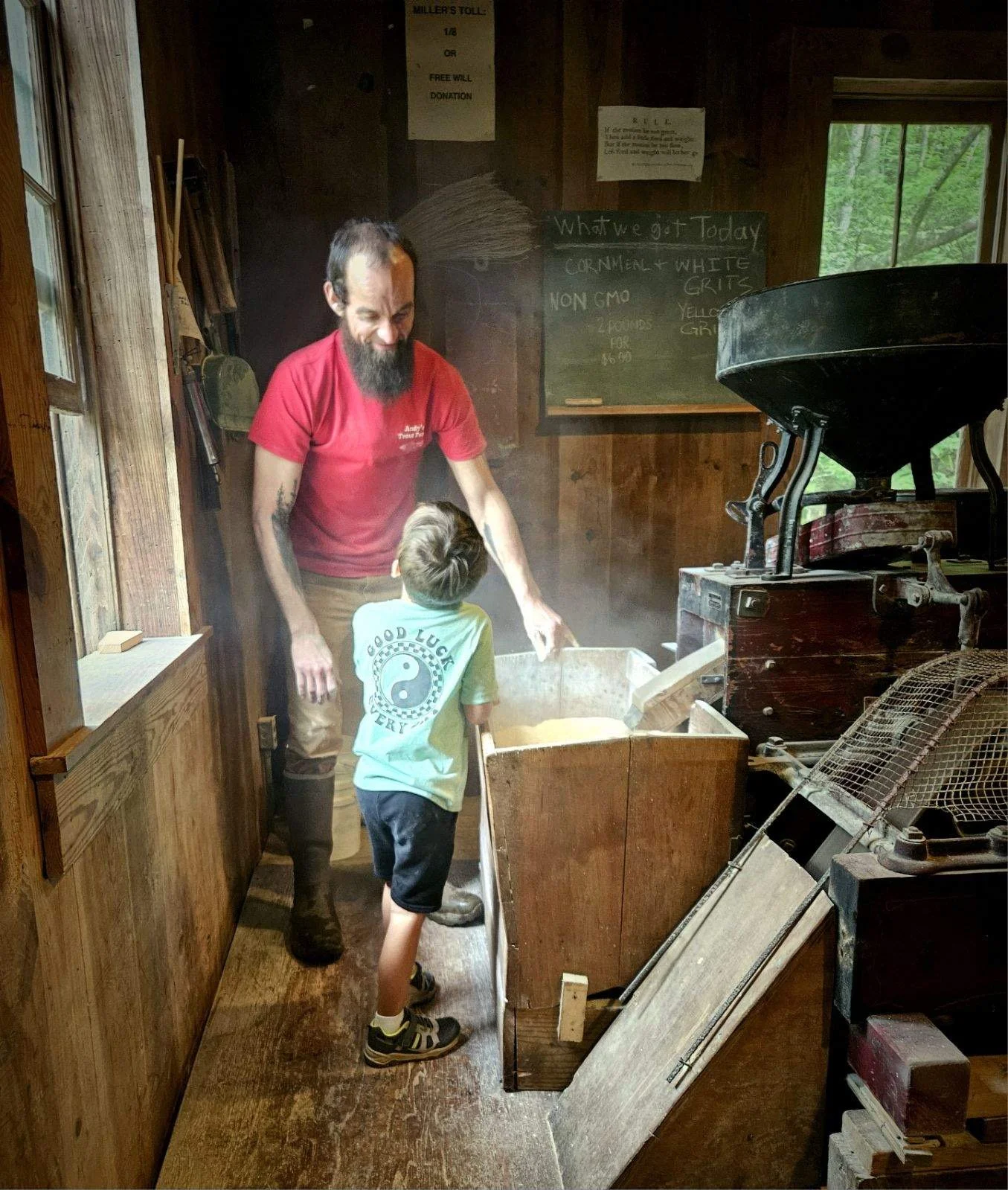 A father and son sharing a moment together at historic Barker's Creek Mill.