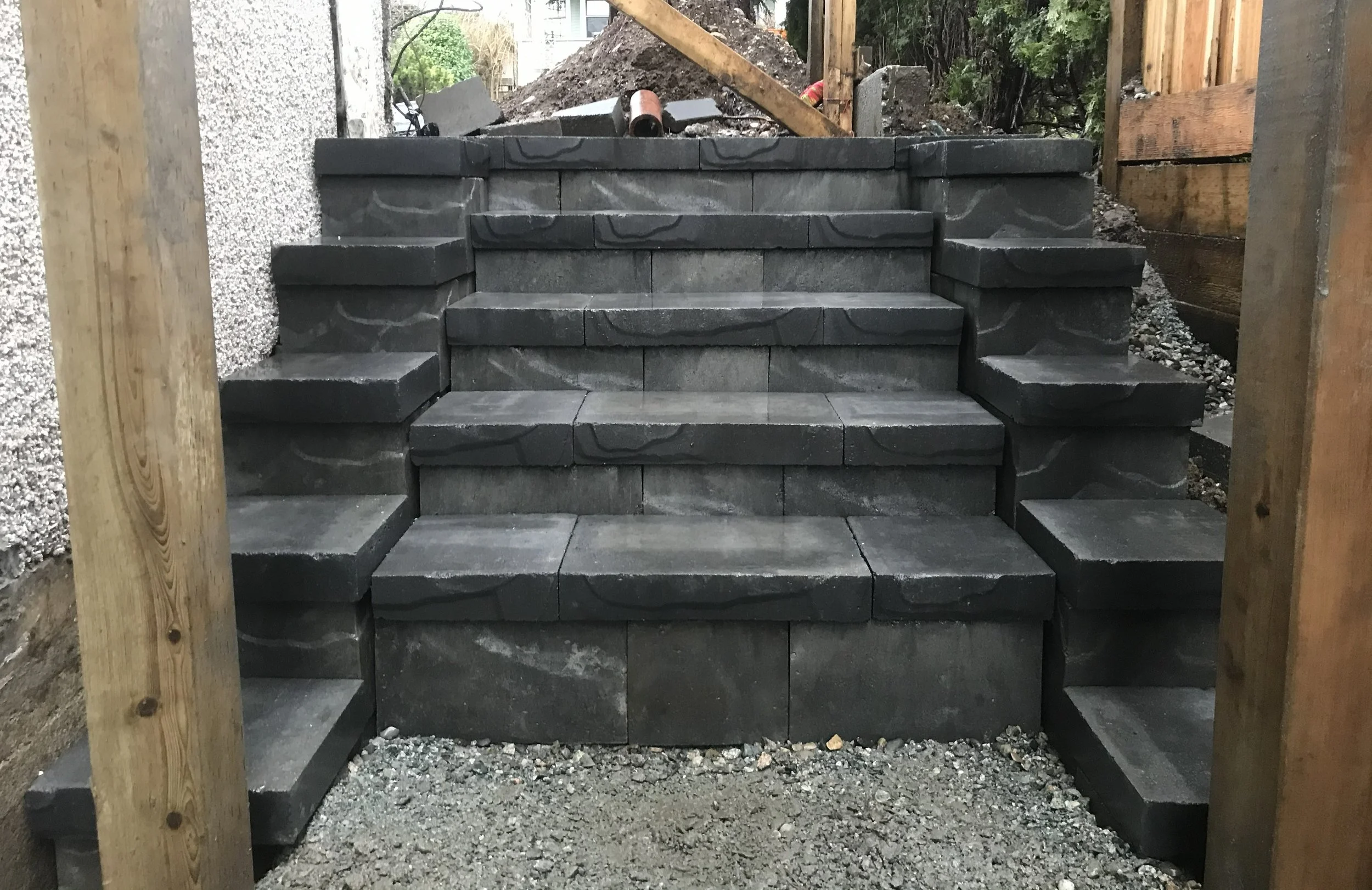 Fully custom allan block stair installation.